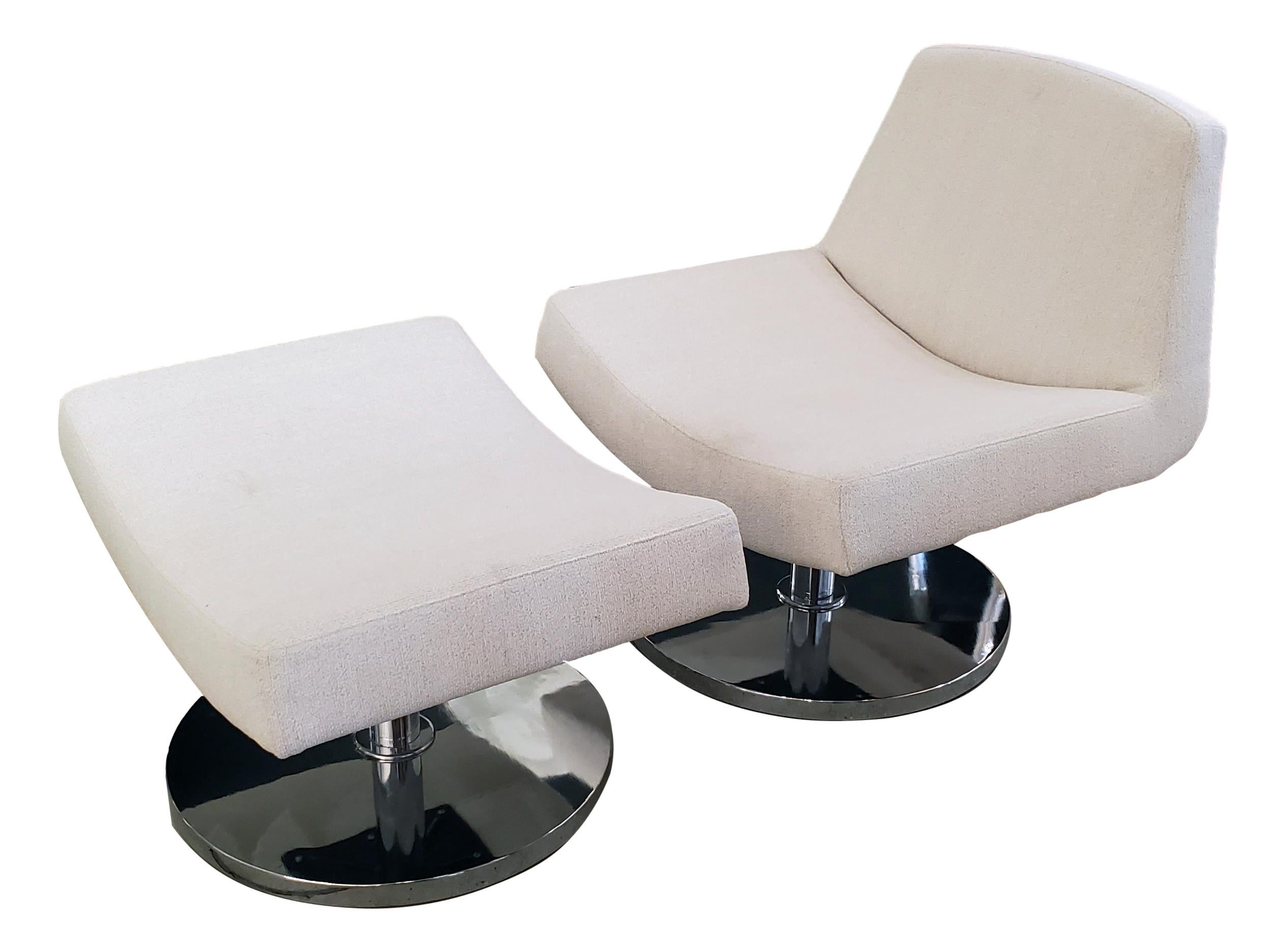 Swivel chair and ottoman by Goodman Charlton.  
Frame: Select hardwood and industrial grade plywood cover with polyurethane foam and polyester fiber.
Suspension: 3” unidirectional webbing.
Cushions:  Seat & back; multiple density/IFD polyurethane
