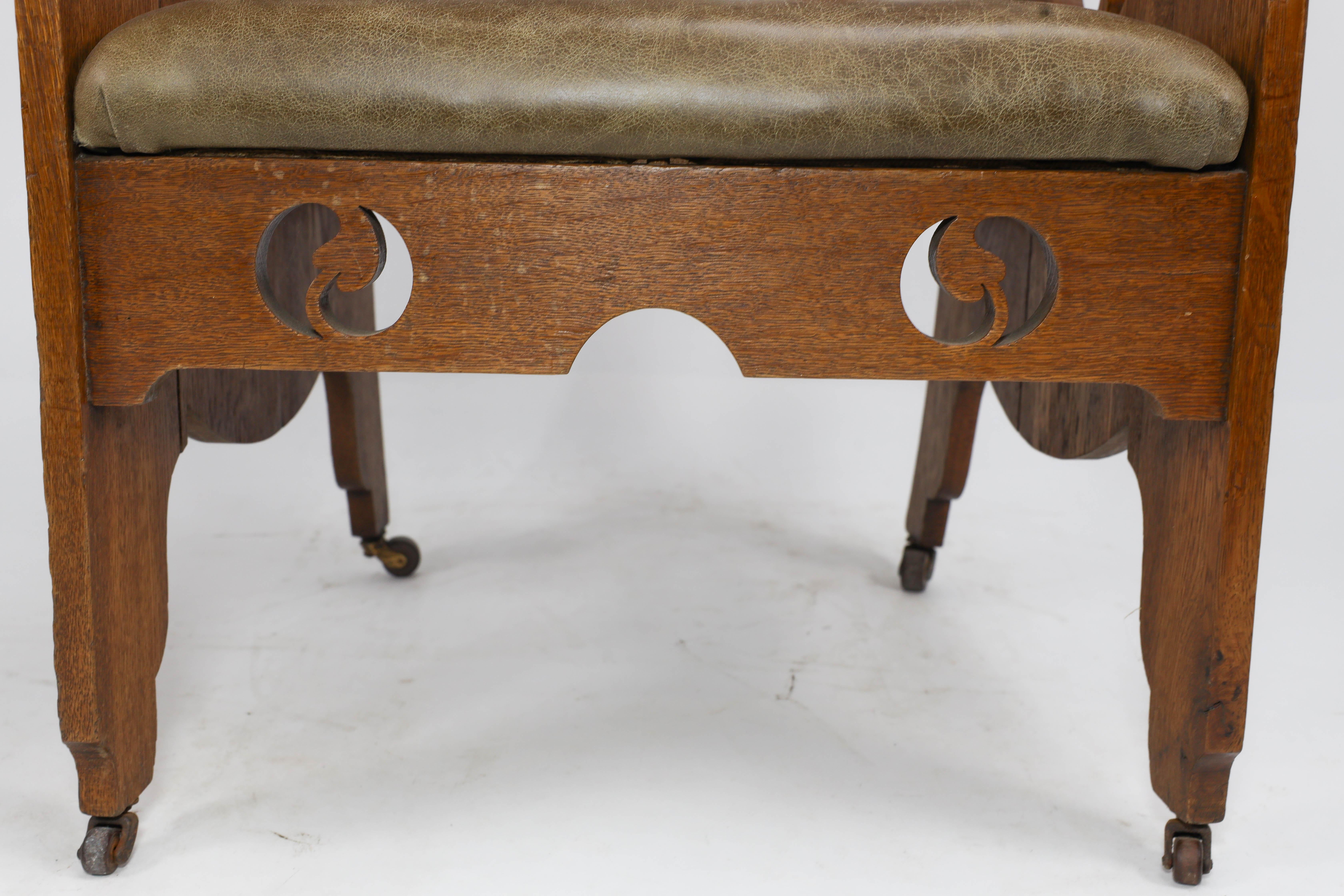 Goodyers of Regent St. An Arts & Crafts oak armchair with stylized decoration For Sale 2