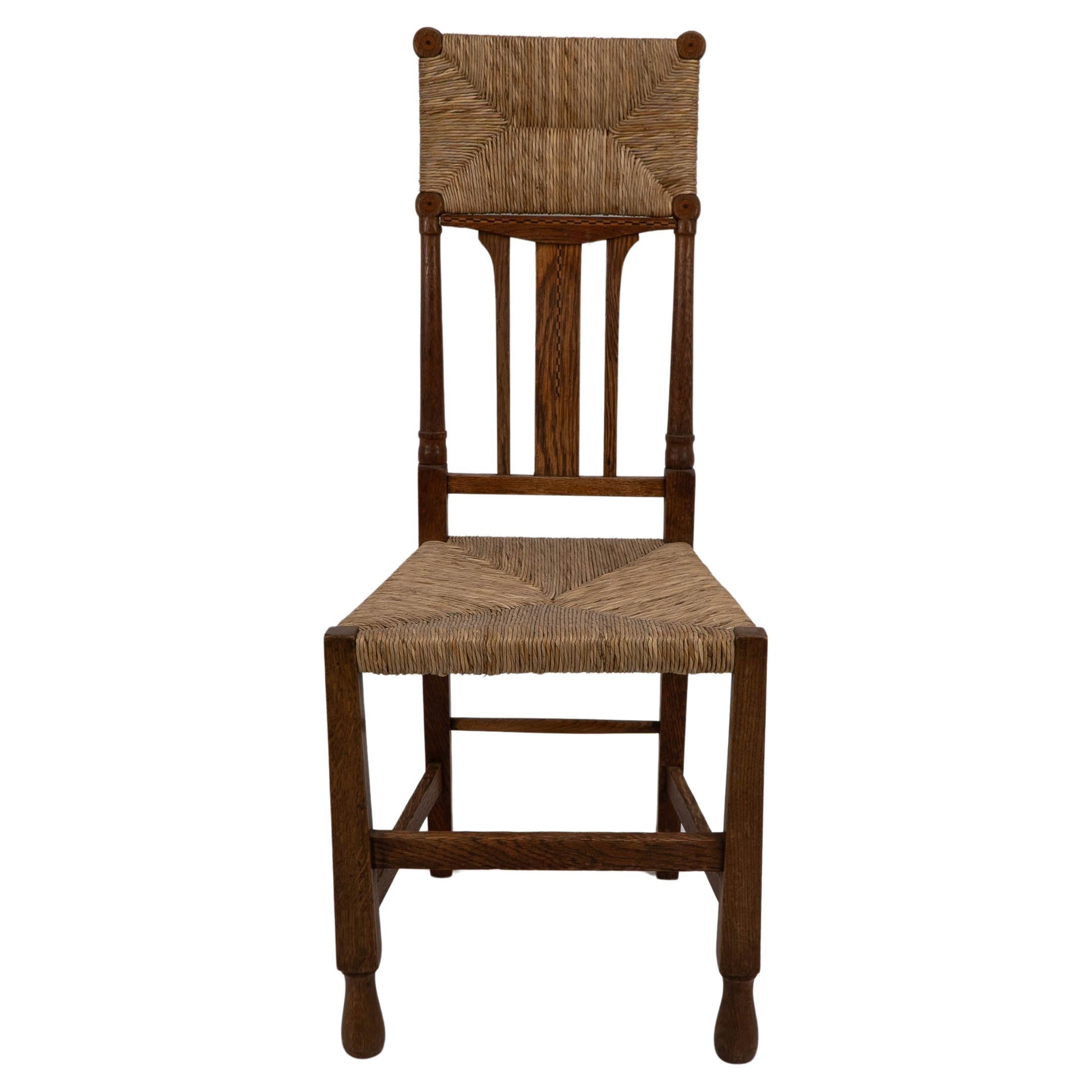 Goodyers of Regent St. George Walton style. An Arts & Crafts inlaid rush seat For Sale