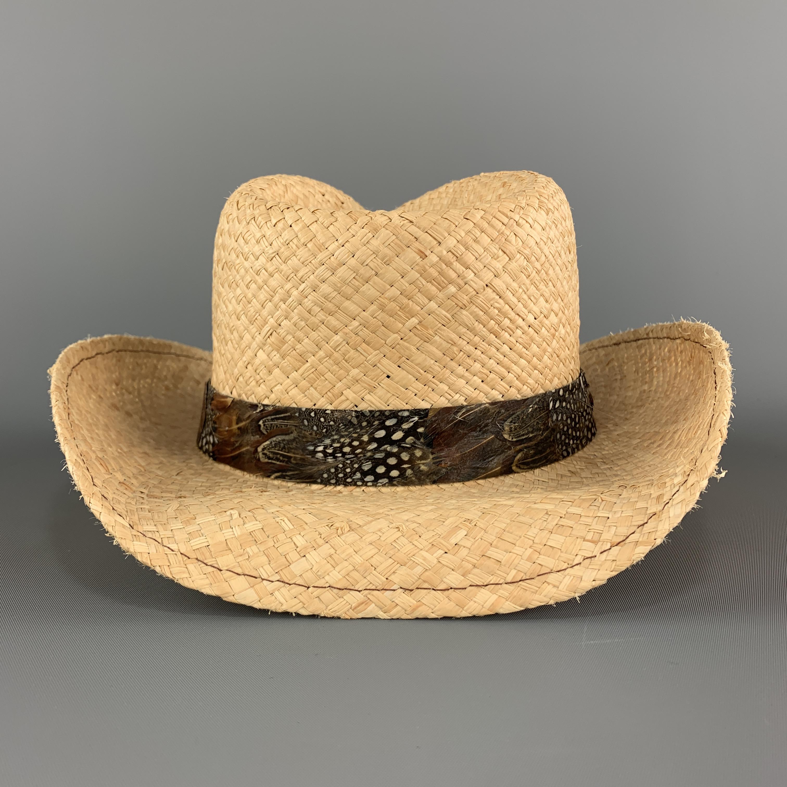 GOORIN BROTHERS cowboy hat comes in woven straw with feather stripe band. Made in USA.

Excellent Pre-Owned Condition.
Marked: Large

Measurements:

Opening: 23.75 in.
Brim: 3 in.
Height: 4.75 in.