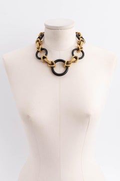 Goossens Halskette aus vergoldetem Metall und Holz