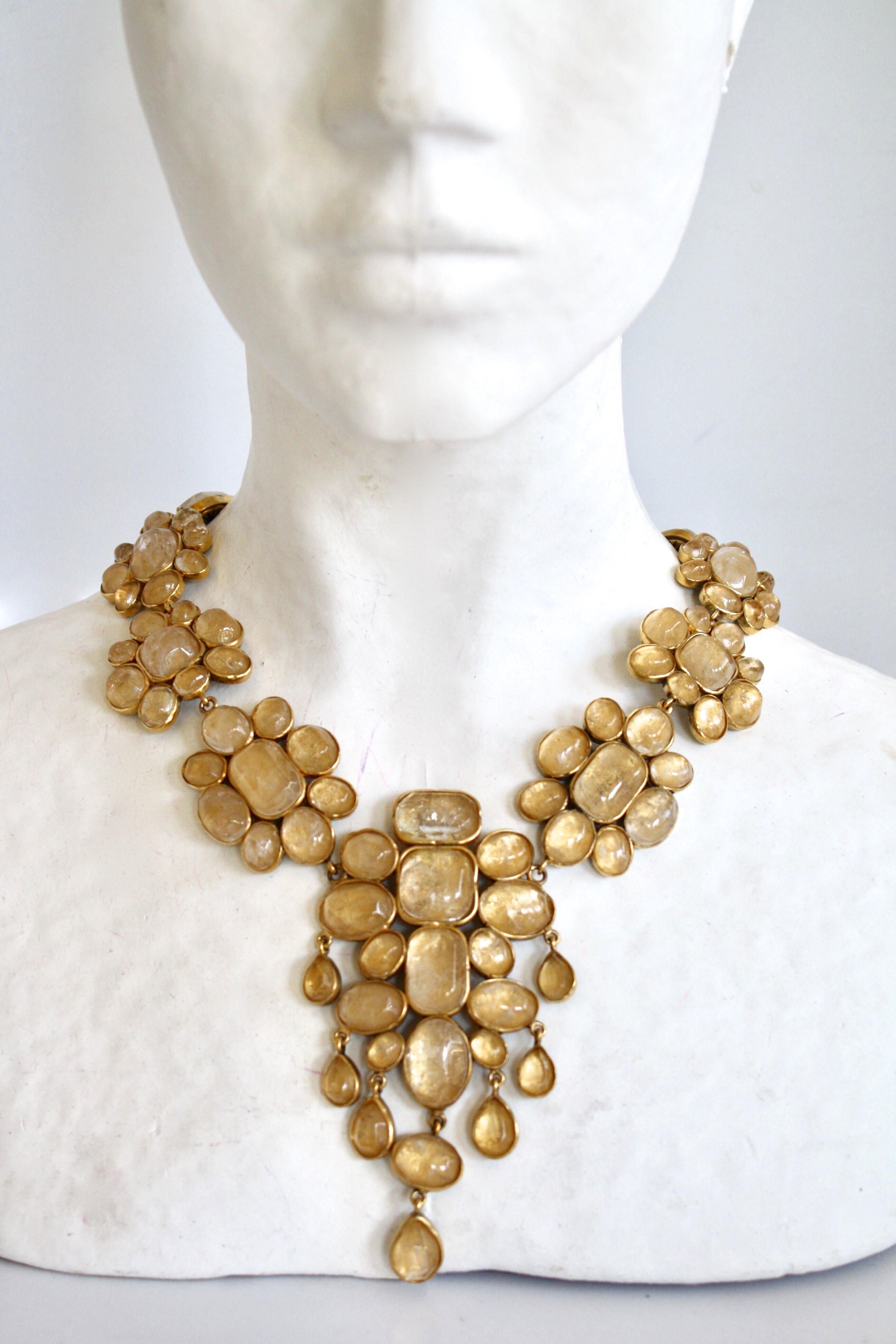 Gorgeous clear rock crystal necklace set on gold in a drop floral shape from Goossens Paris. 

Drop is 4