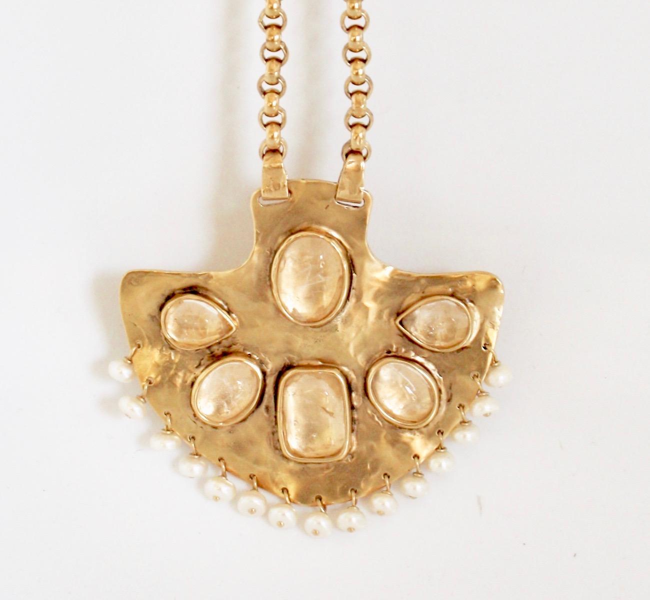 Gold-toned brass pendant necklace from Goossens Paris with natural pearls and rock crystals on chain. 

Pendant is 3