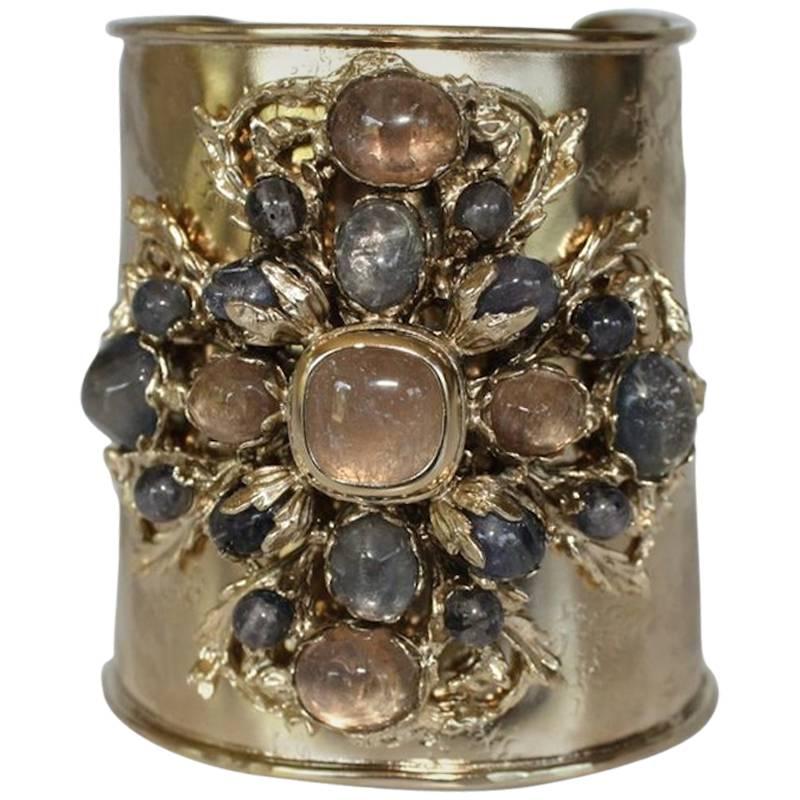 Gilded bronze, iolite and tinted rock crystal cuff bracelet from Goossens Paris. Bronze is soft so bracelet adjusts to fit both small and large wrists. 