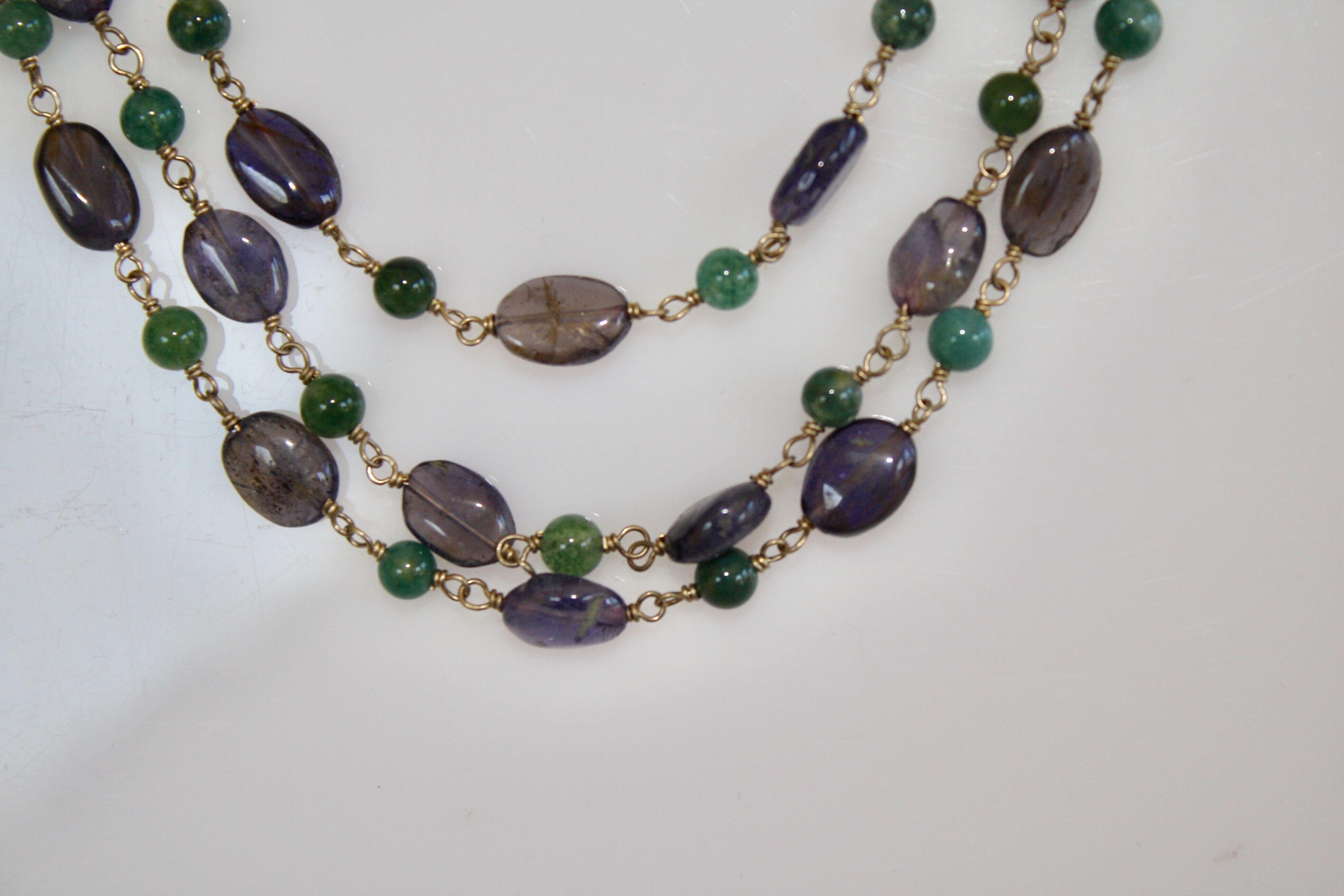 Graduated length triple strand necklace in Iolite and rock crystal from Goossens Paris. 