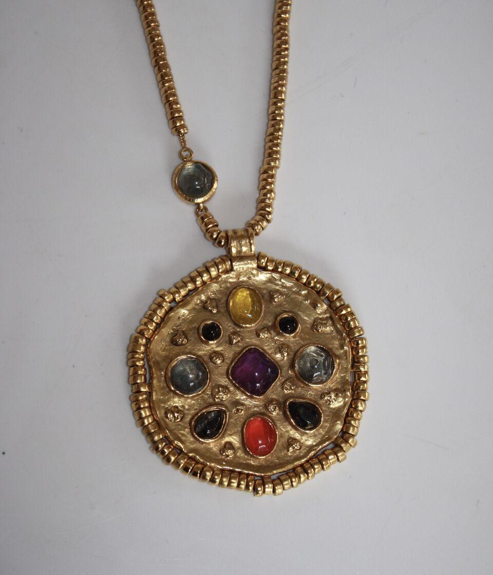 Gold chain long necklace with round hammered plate pendant. Pendant and chain are adorned in hand dyed rock crystals. 