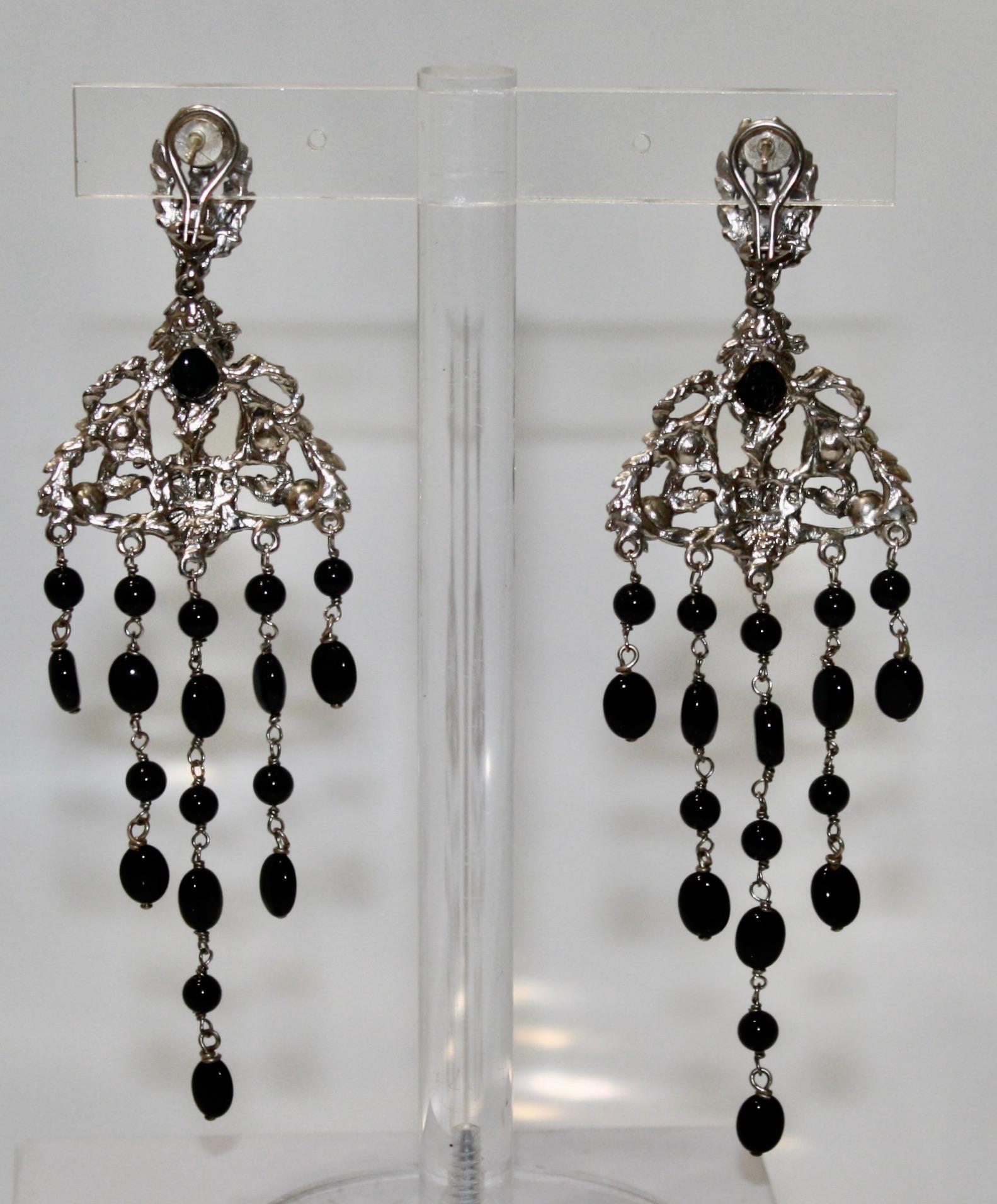 French back chandelier earrings with tinted pink rock crystal cabochons, black onyx chain drop . Ruthenium metal