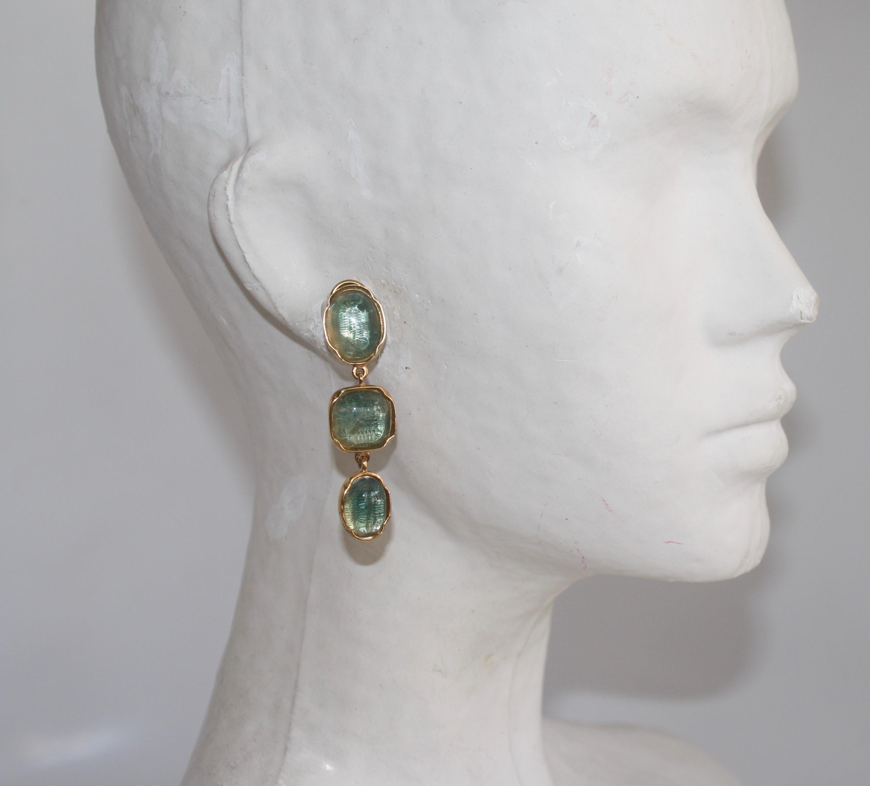 Hand tinted blue rock crystal triple drop clip earrings from Goossens Paris. Set in 24 karat gold plate. 