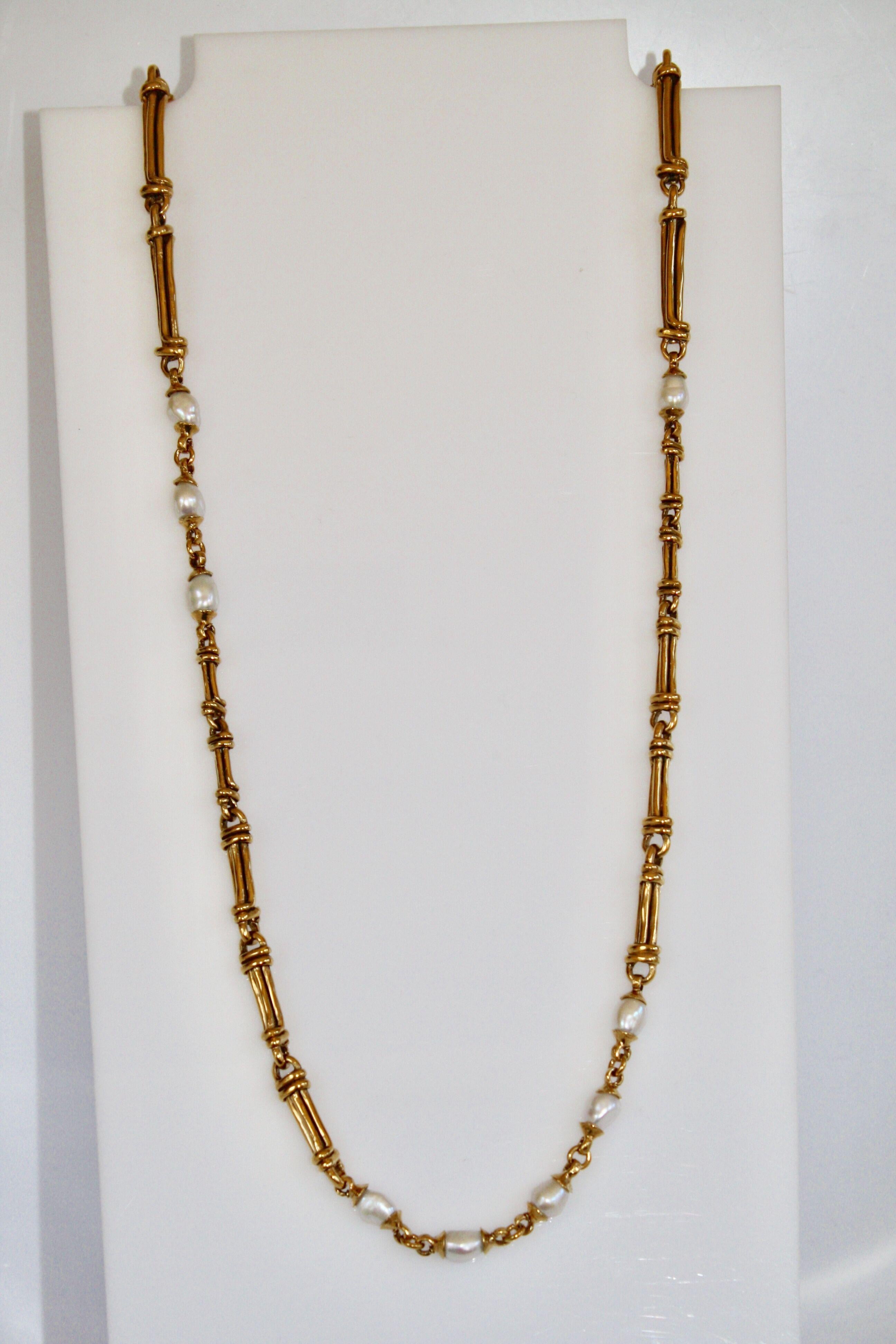 Yellow gold and pearl long necklace from Goossens Paris. Can we work long as a single strand or doubled, as pictured here. 