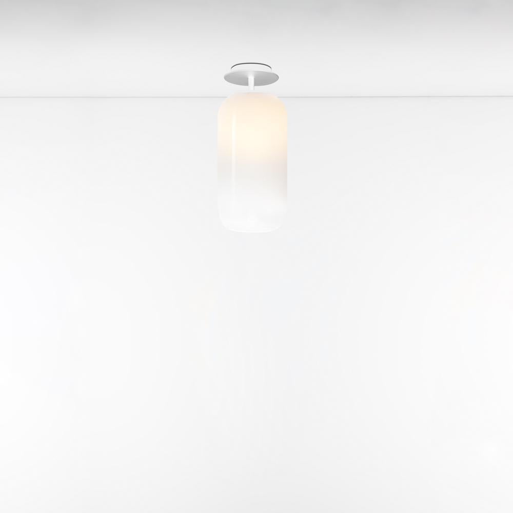 Gople classic ceiling light in white/white for Artemide. 

The Gople Lamp is the latest product in the ongoing collaboration between Artemide and Bjarke Ingels Group. The basic form of the Gople Lamp enhances the beauty of the glass, which is