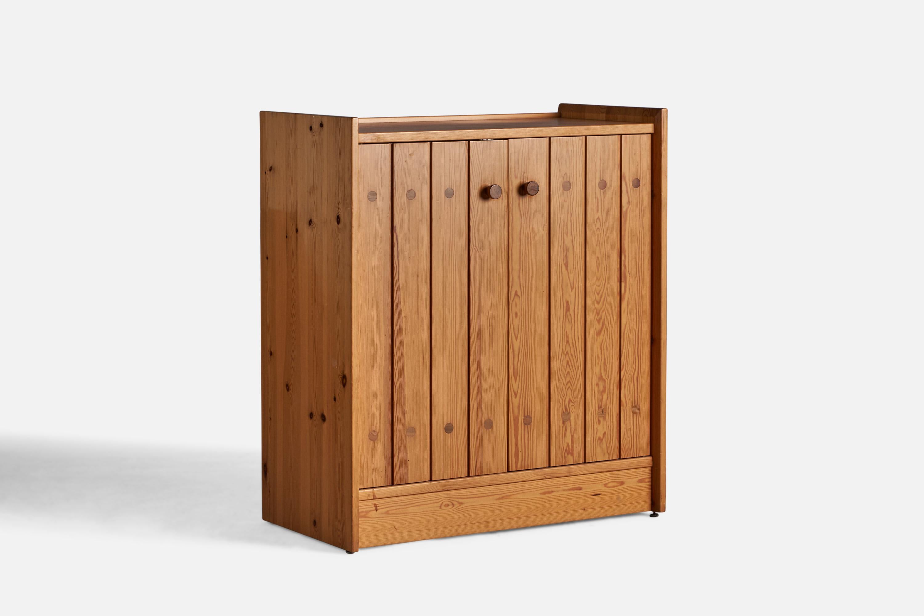 A pine cabinet designed by Göran Malmvall and produced by Karl Andersson & Söner, Sweden, 1970s.