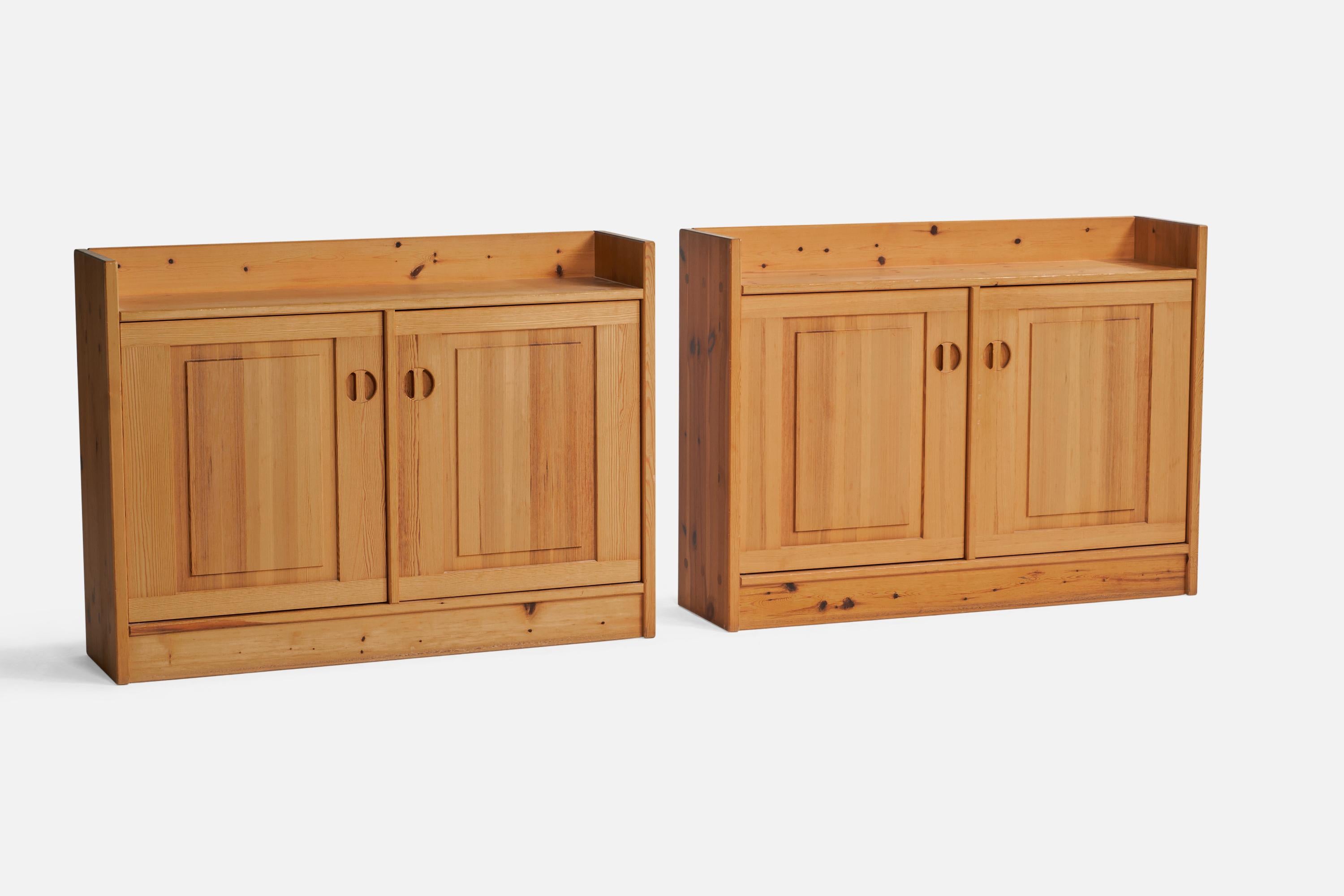 A pair of pine cabinets designed by Göran Malmwall and produced by Karl Andersson & Söner, Sweden, c. 1960s.

