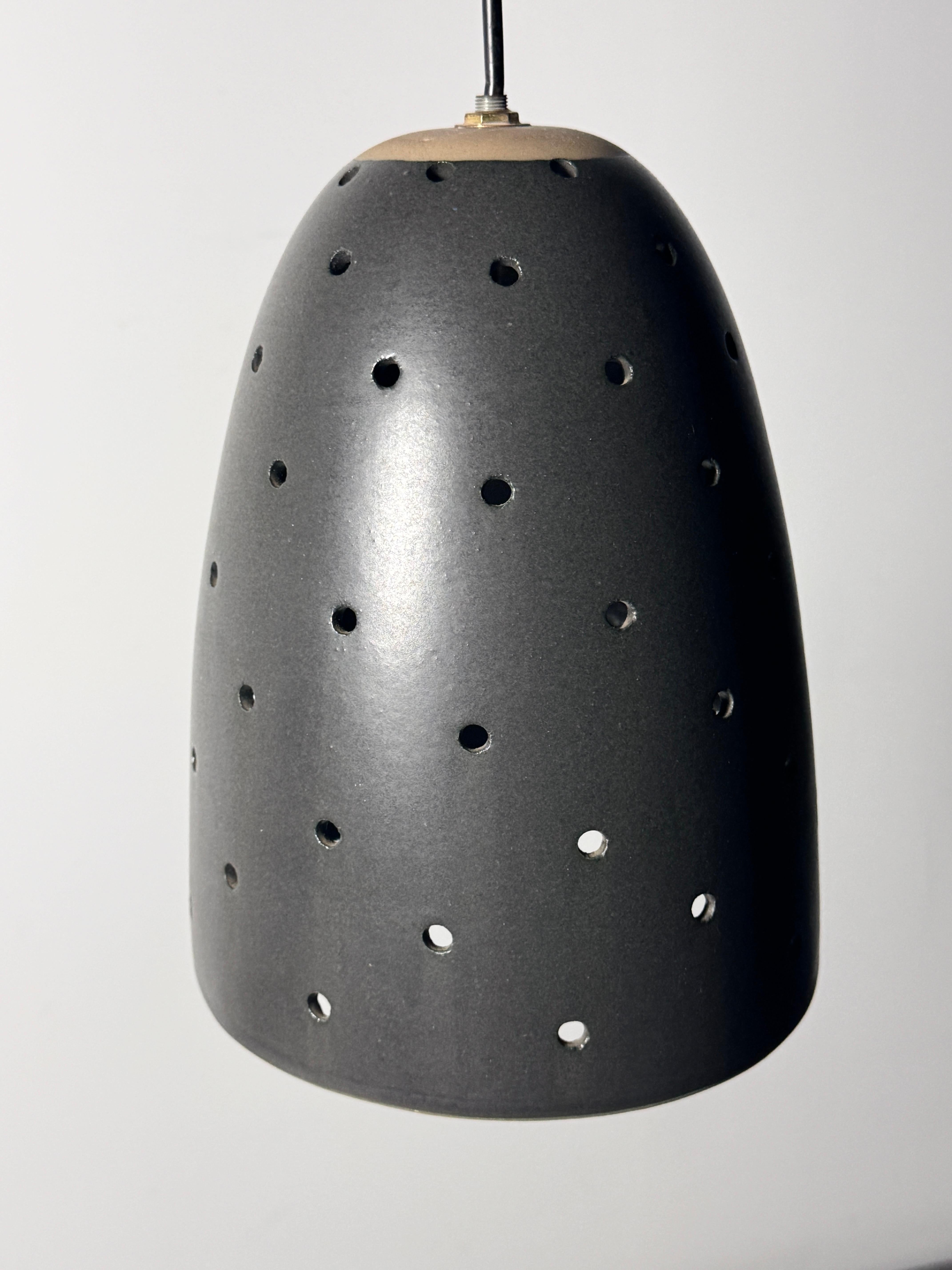 Mid-Century Modern Gordon and Jane Martz Marshall Studios Pierced Black Ceramic Pendant Lamp 1960s
