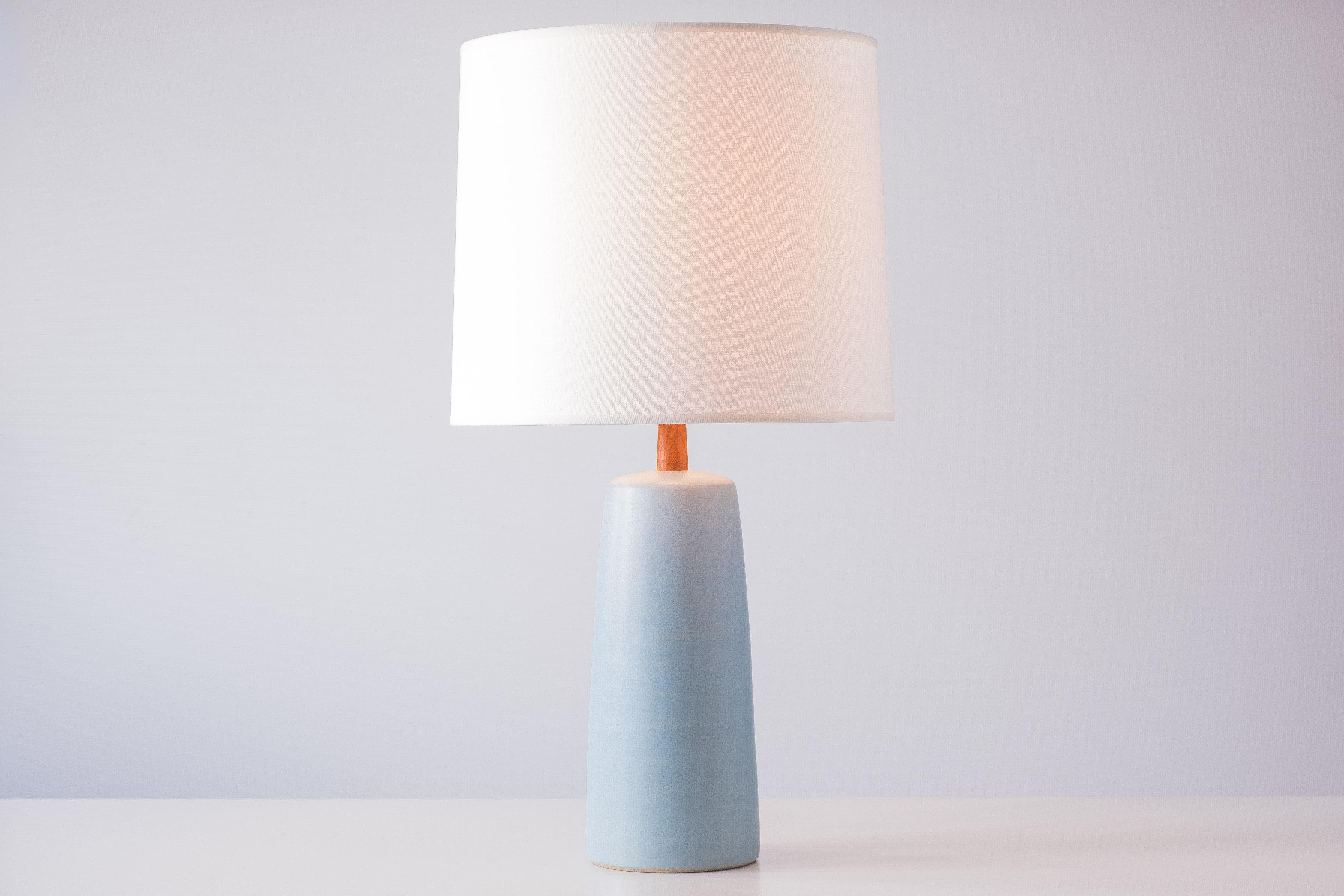 What is it?
—
Another gem from the masters of mid century lightning – Gordon and Jane Martz. Not too big, not too small – this ceramic lamp is equally at home on an end table or credenza as it is on a dresser or bedside table. 

This signed Martz