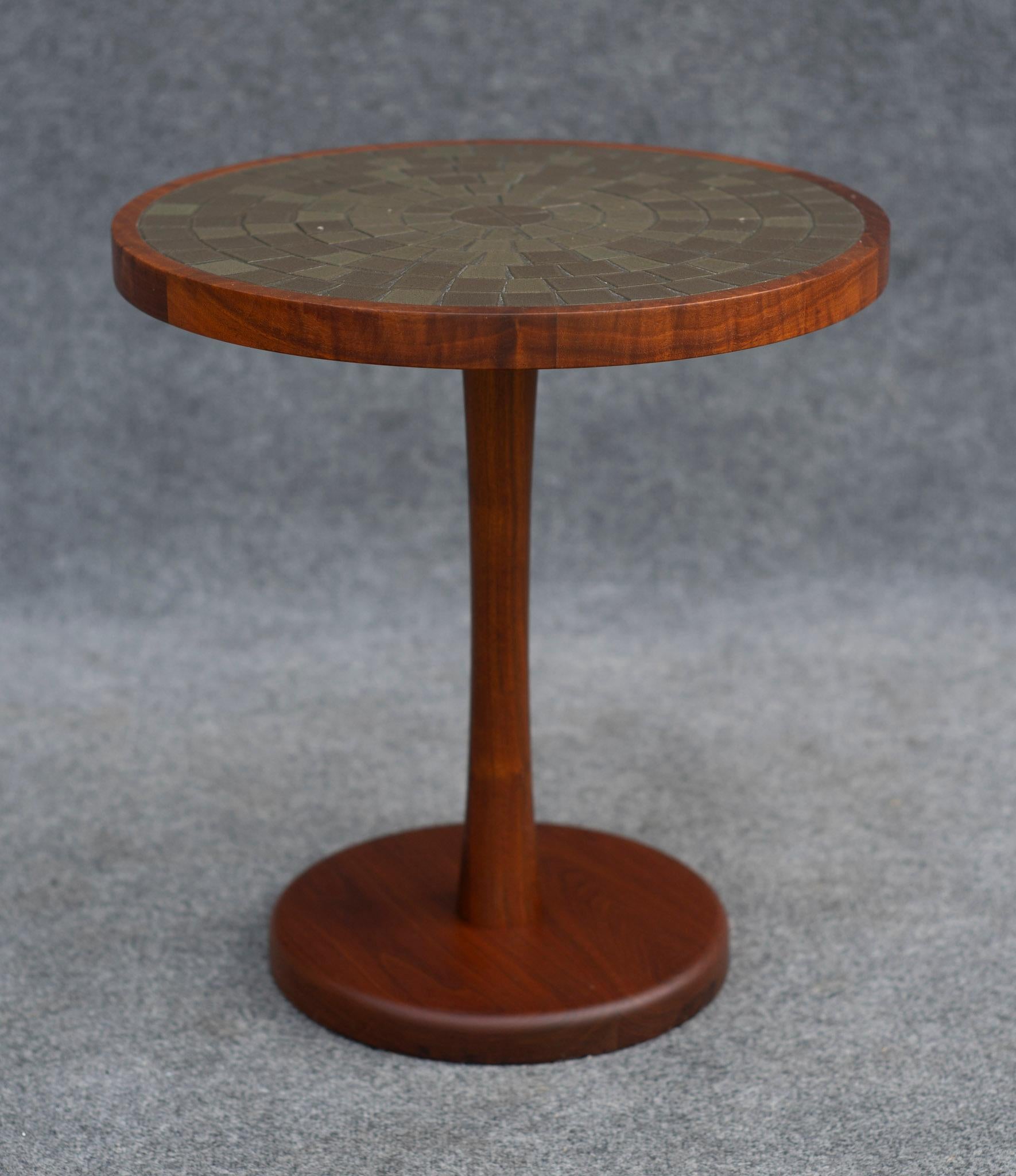 Designed by wife & husband duo Gordon & Jane Martz, this table was produced by Marshall Studios in the 1950s. A shining example of Mid-Century as a whole, this piece features everything you could want out of a side table. Extraordinary