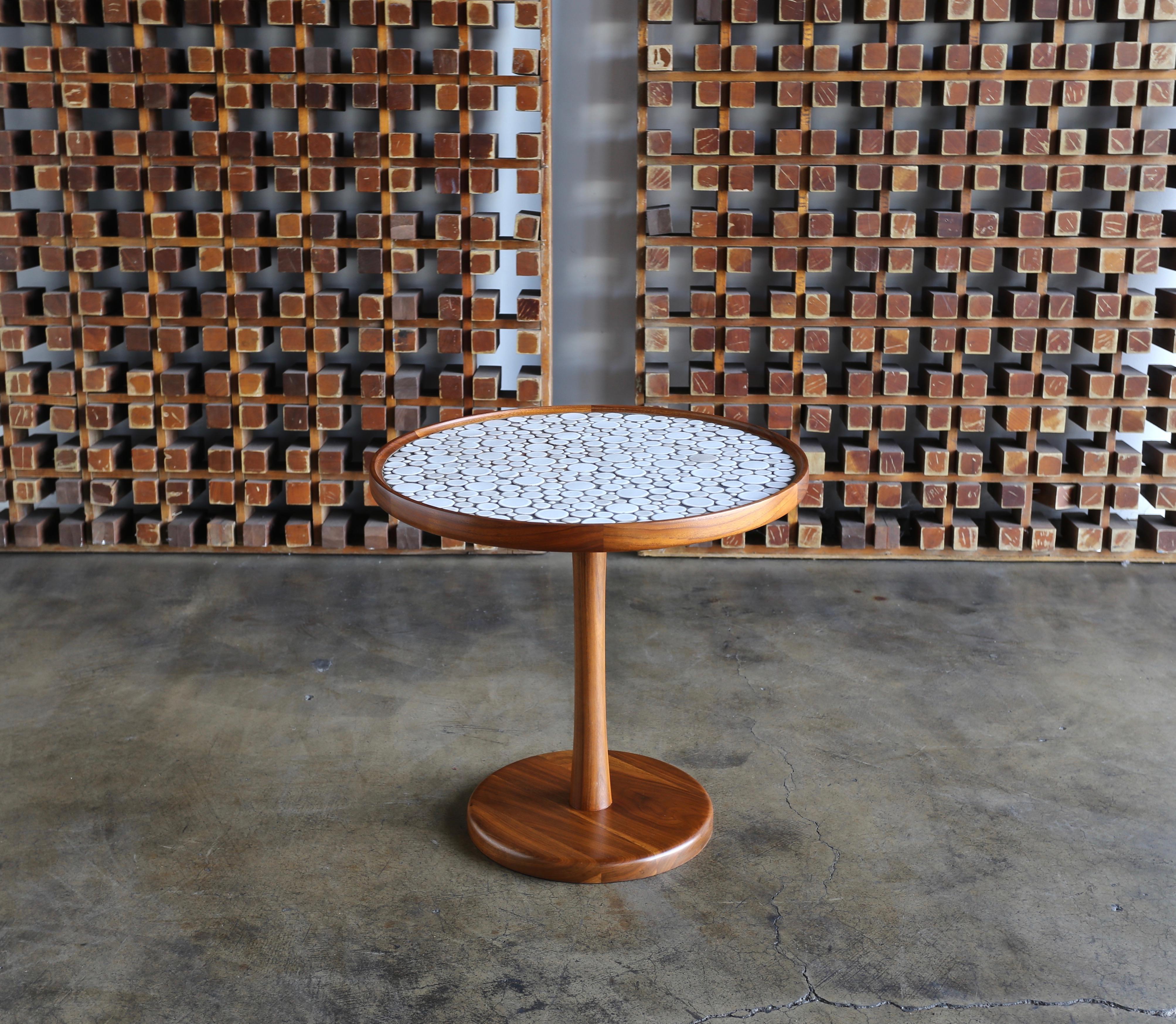 Ceramic tile-top occasional table by Gordon Martz. Measures: 24