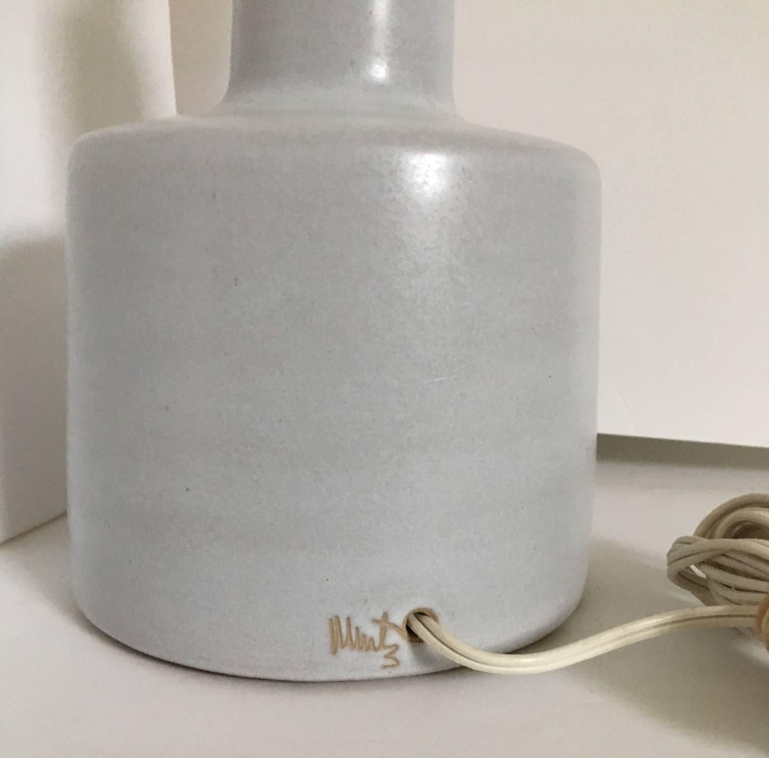 Organic studio pottery lamp by the famed Gordon and Jane Martz studio, 1960s. Wired and in working condition with original wiring and socket. Marked with the stamped Martz mark at cord opening. Lamp uses an uno ring or clip-on shade; not included.