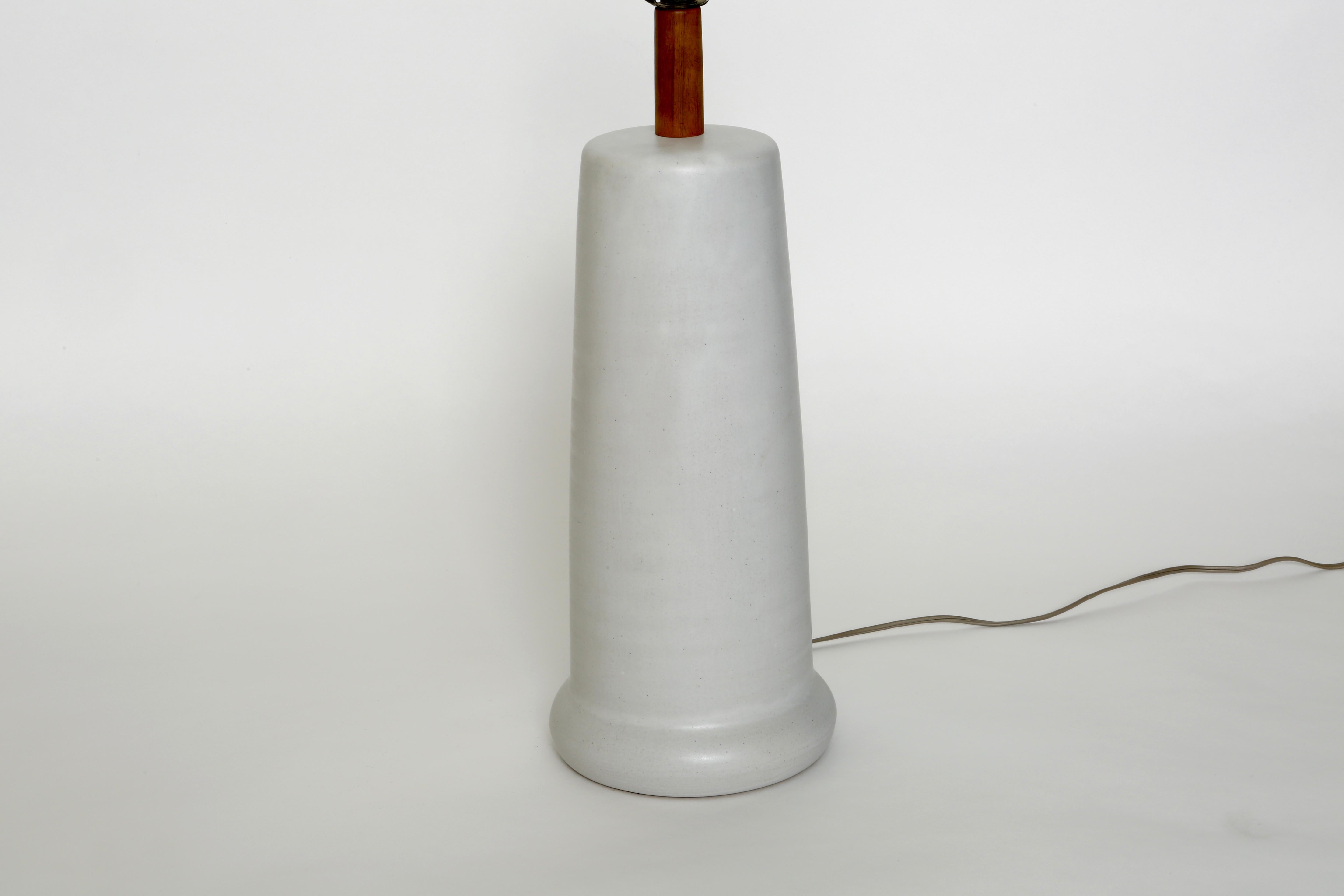 Gordon Martz for Marshall Studios table lamp.
Ceramic body with wooden stem. Signed.
