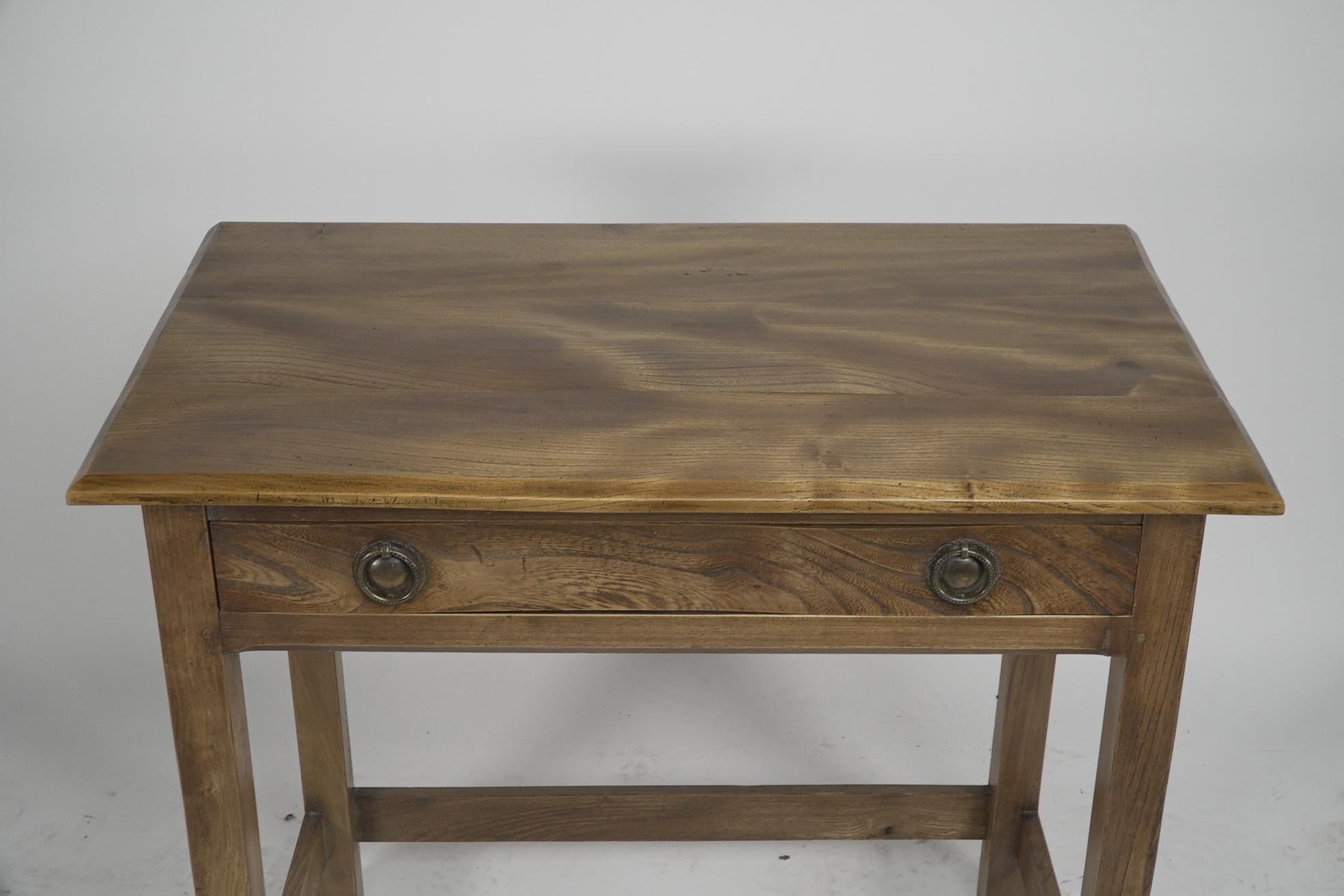 Gordon Russell. A fine quality Cotswold School ash single drawer desk. With brass Gordon Russel Ltd. Broadway Worcs to the back. This timeless piece of Cotswold history is fit for purpose with no front stretcher giving you all the legroom necesary