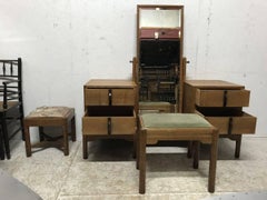 Gordon Russell. an Arts & Crafts Cotswold Oak Dressing Table and Matching Stool