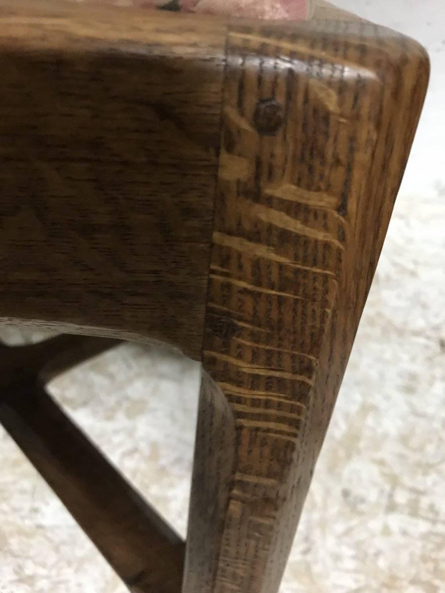 Mid-20th Century Gordon Russell, an Arts & Crafts Cotswold Oak Stool with Carved Cross Stretcher