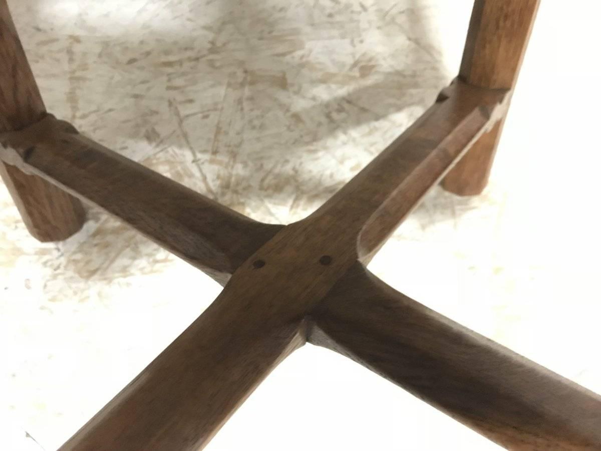 Gordon Russell, an Arts & Crafts Cotswold Oak Stool with Carved Cross Stretcher 3