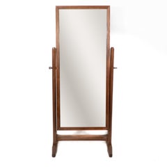 Gordon Russell. An Arts & Crafts oak floor standing full length dressing mirror