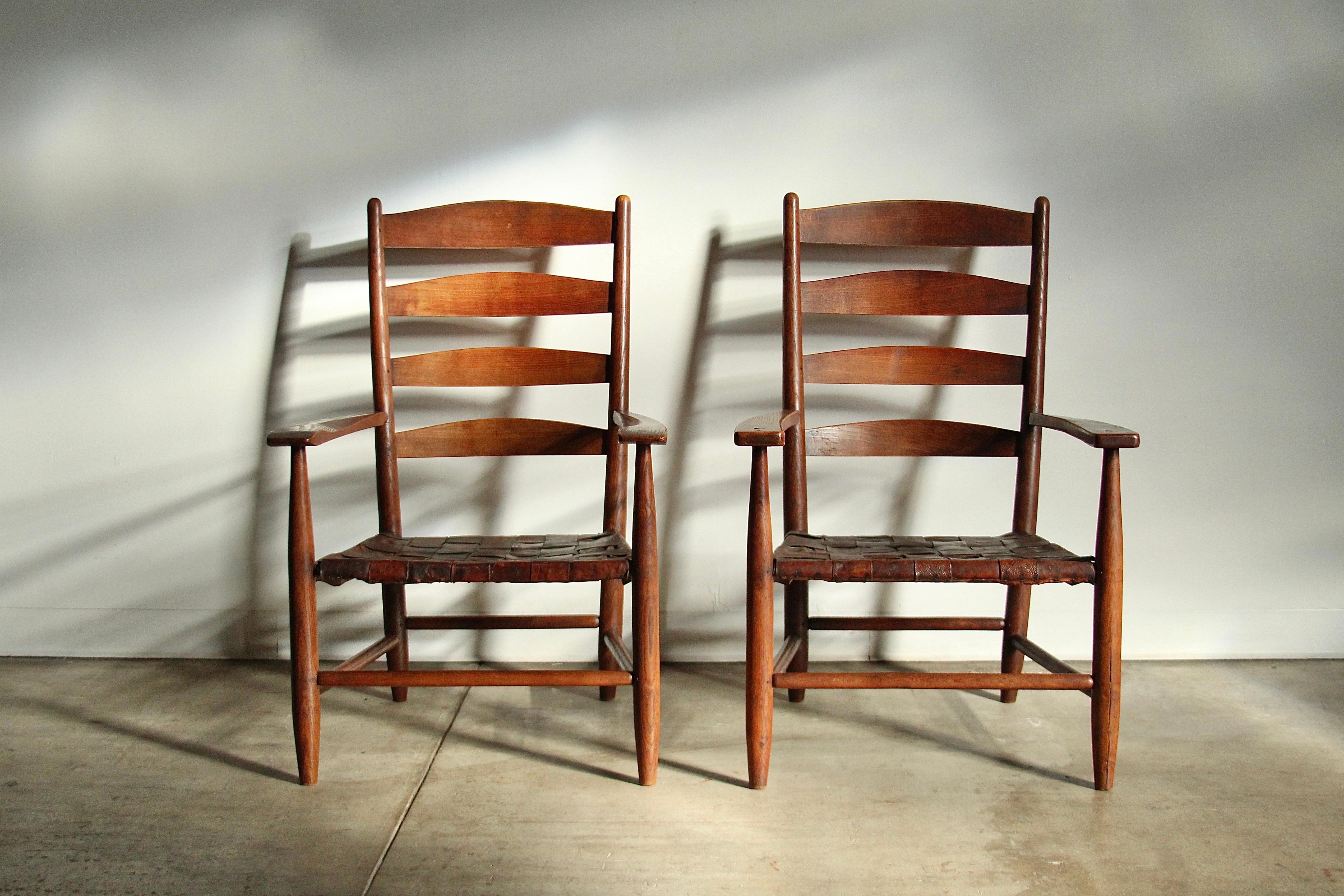 English Gordon Russell Hand Built Ladder Back Oak & Woven Leather Lounge Chairs, 1904 For Sale