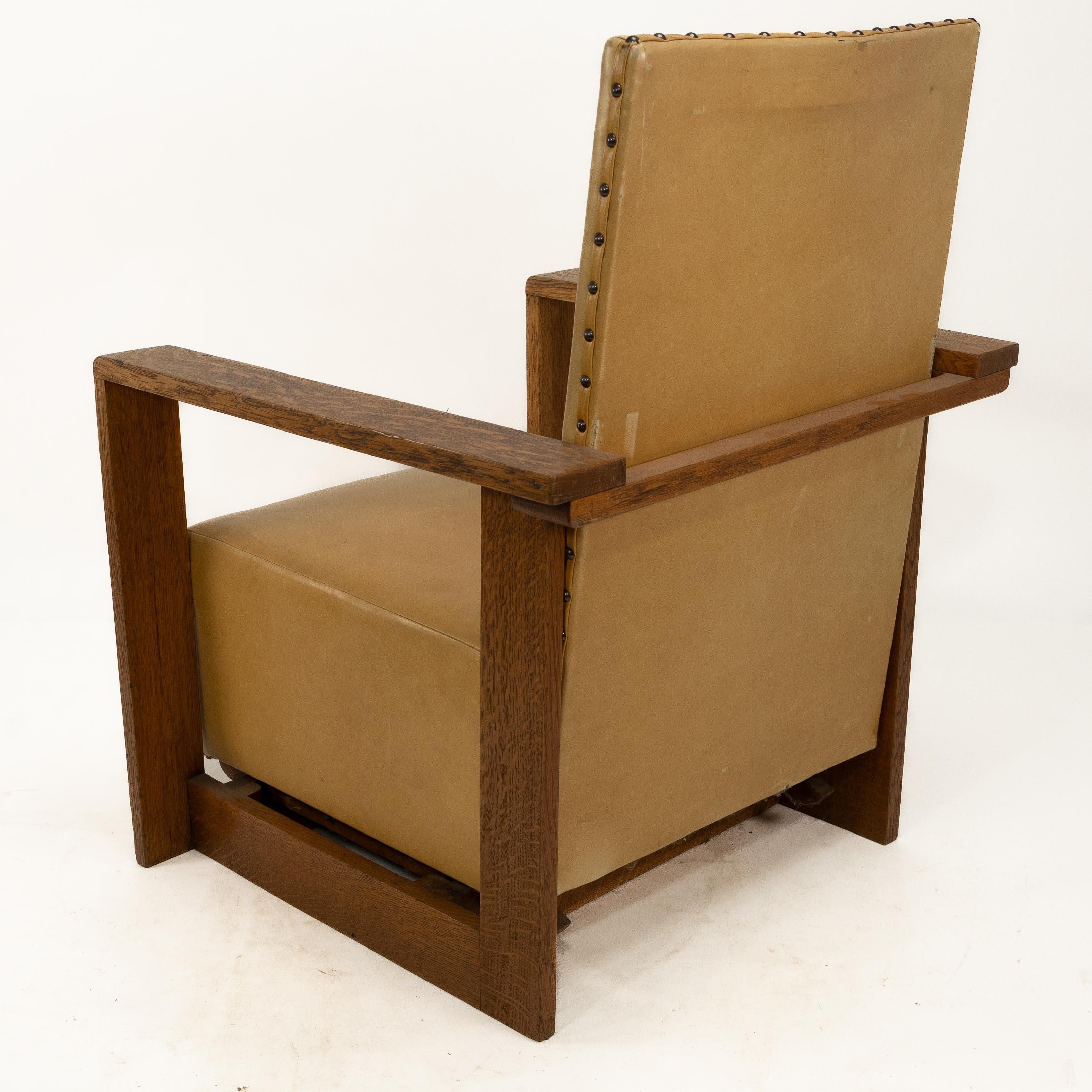 Gordon Russell, W. H. Russell. A pair of Arts & Crafts oak reclining armchairs 8