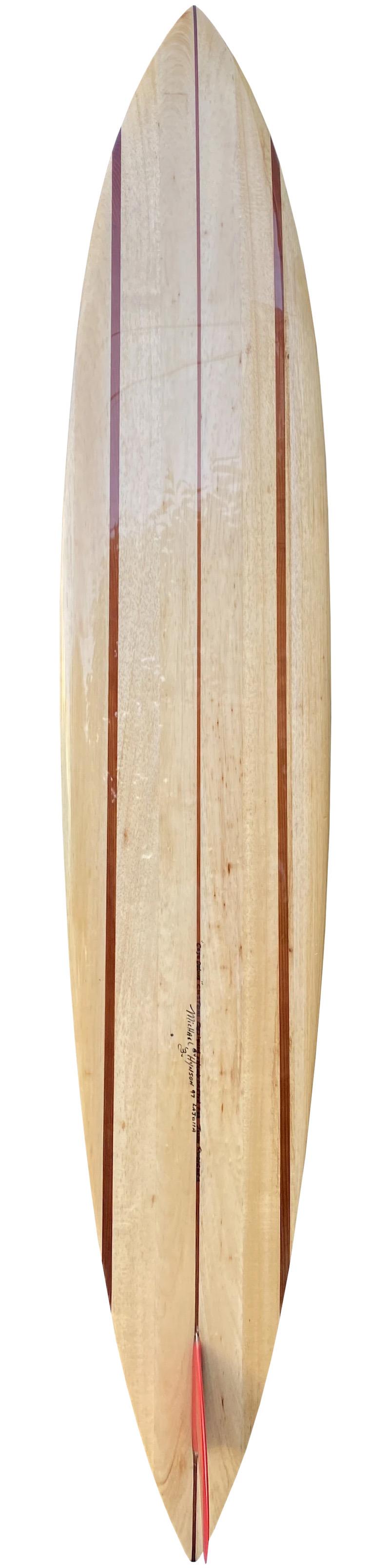 1997 Gordon & Smith balsawood Big Wave surfboard shaped by Mike Hynson. Features a 3-stringer design with pintail shape paired with the famous red fin (hallmark of Hynson shaped surfboards). This rare “Cojo model” was made for fellow surfboard and