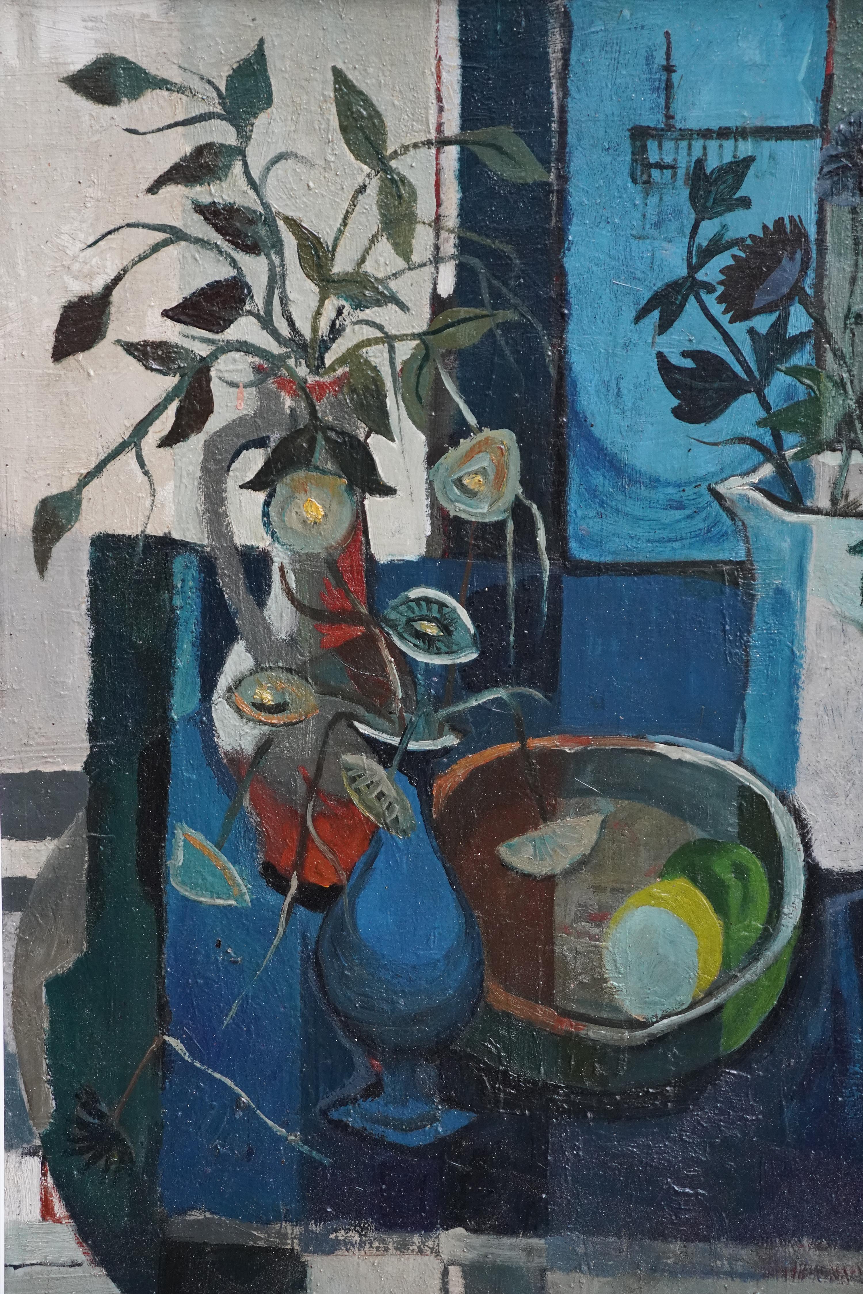 Gordon Wylie, Scottish artist painted this wonderful still life oil painting. Painted circa late 1950's it is a still life of three vases on a table with a bowl of lemon and lime. The painting has an abstract Cubist feel to it with blocks of colour