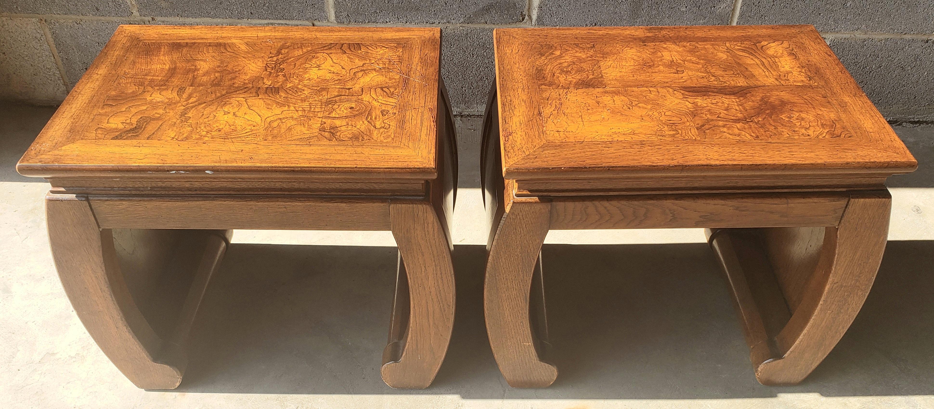 A pair Asian design fruitwood burl side tables by Gordon's Fine furniture of Tennessee.
Inlaid burl top. Very solid and heavy. Measurements are 18.5
