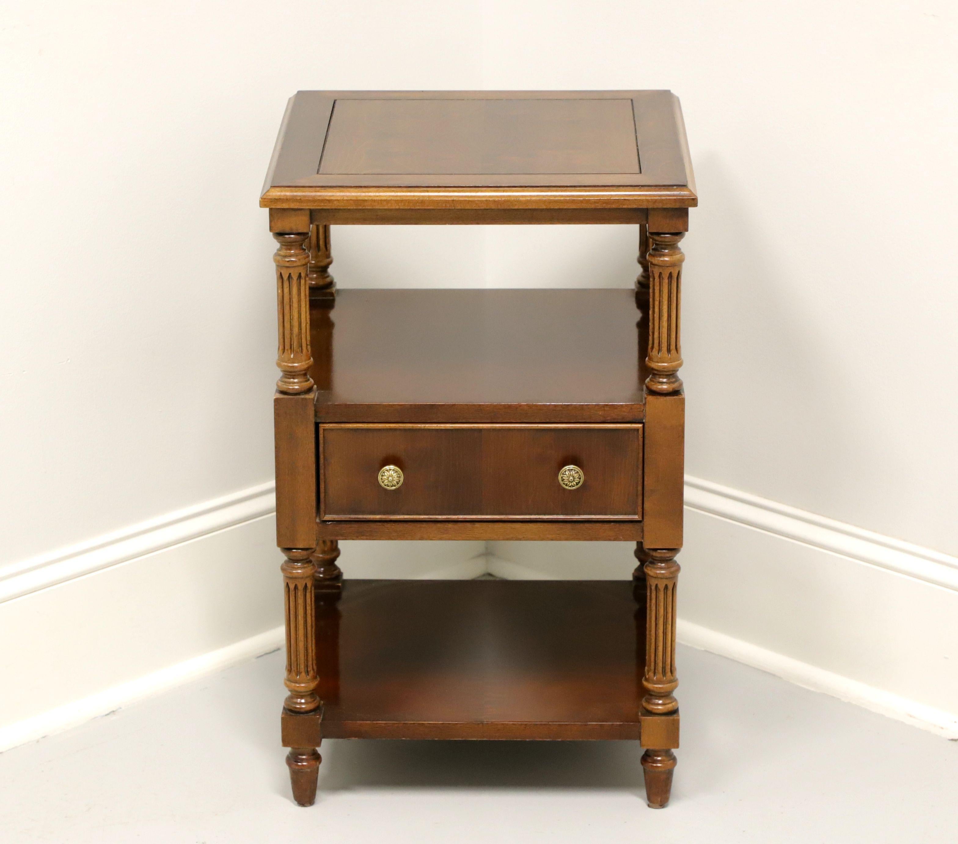 A vintage French Louis XVI style square telephone / end table by Gordon's Furniture, of Johnson City, Tennessee, USA. Mahogany with banded top, brass hardware, two tiers, fluted column supports and spade feet. Features one center dovetail drawer