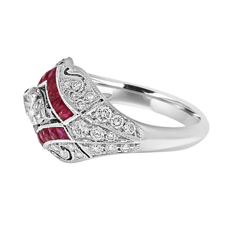 This 0.58 Carat ring has a center marquise cut diamond with the total carat weight of 0.58 accented with ruby stones with the carat weight of 0.57 and surrounded with diamonds with the total carat weight of 1.46. 
                           