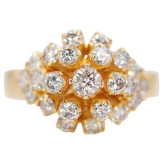 Magnifique bague en diamant de 0,65 ct en forme de bouquet