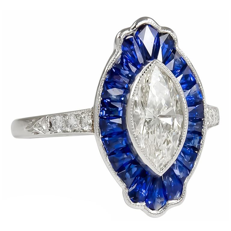 Sophia D. 0.95 Carat Marquise Cut Center Diamond and Blue Sapphire Platinum Ring In New Condition For Sale In New York, NY