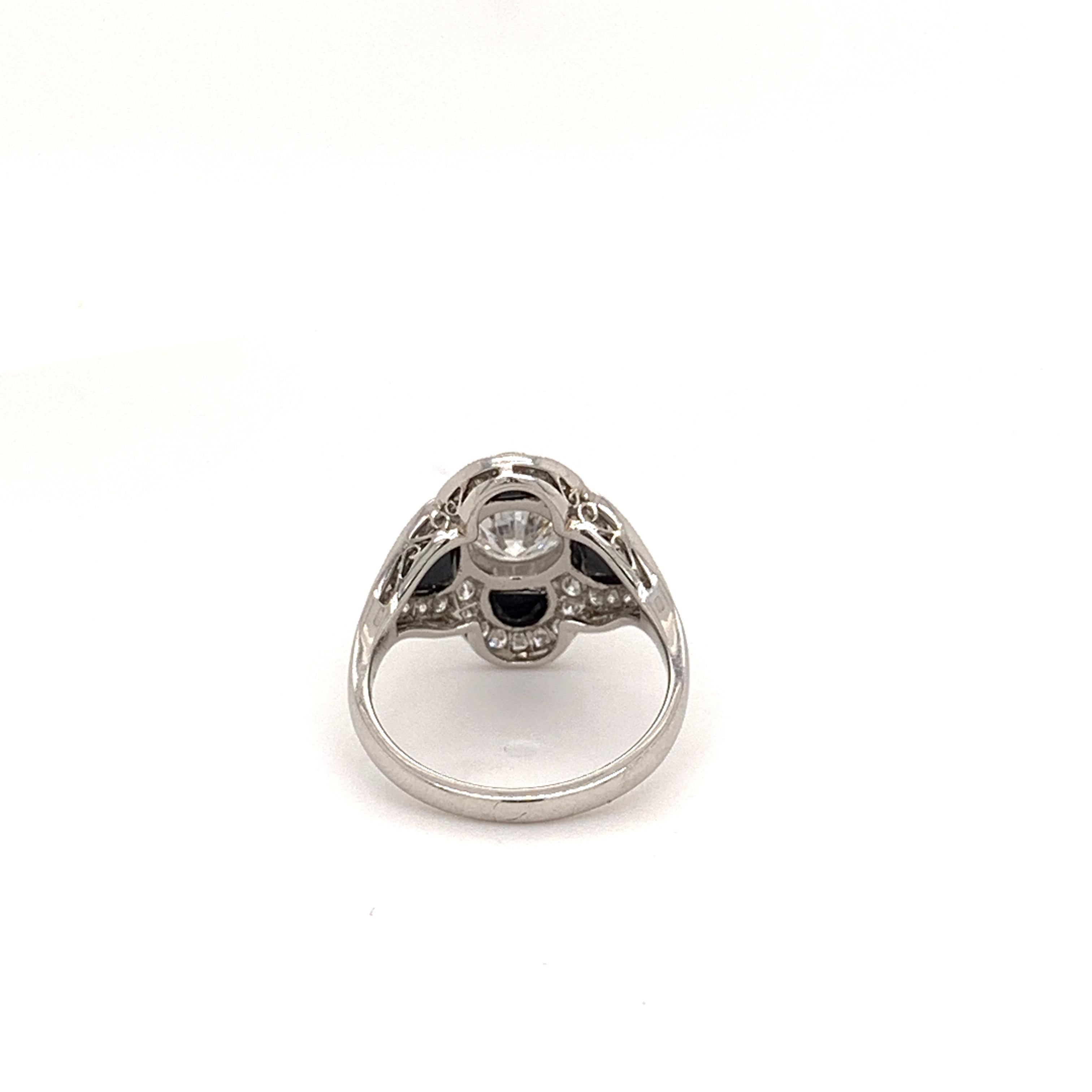 Art deco inspired platinum ring with center round diamond weighing 0.96 carats surrounded with onyx and brilliant diamonds weighing 0.54 carat. 

Sophia D by Joseph Dardashti LTD has been known worldwide for 35 years and are inspired by classic Art