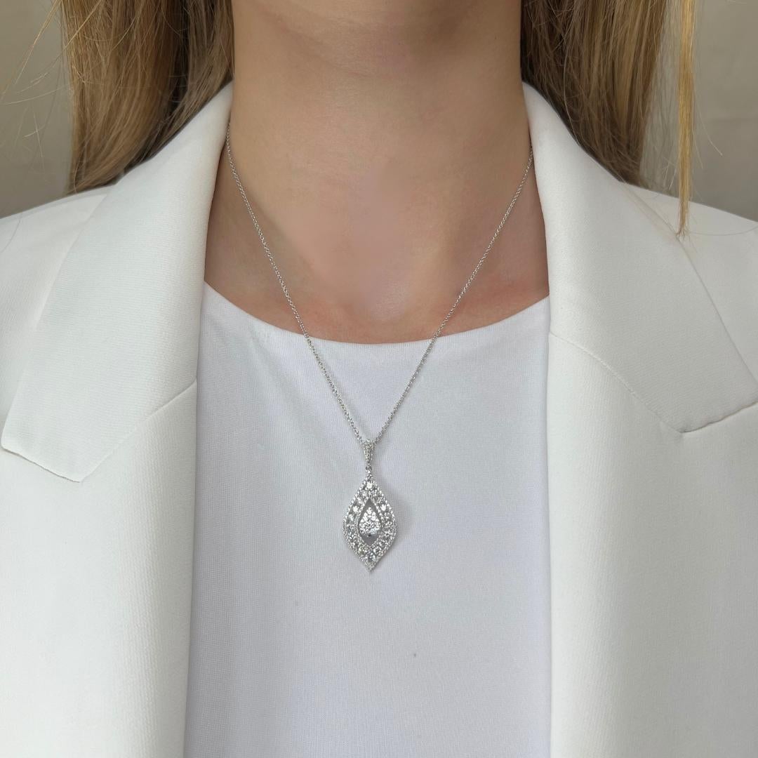 Gorgeous 1.36ct Diamonds Necklace with Pendant in 18k White Gold - IGI Certified

Adorn yourself with the exquisite elegance of this stunning diamond necklace with a pendant. Featuring 125 meticulously set round diamonds totaling 1.36-carat. This