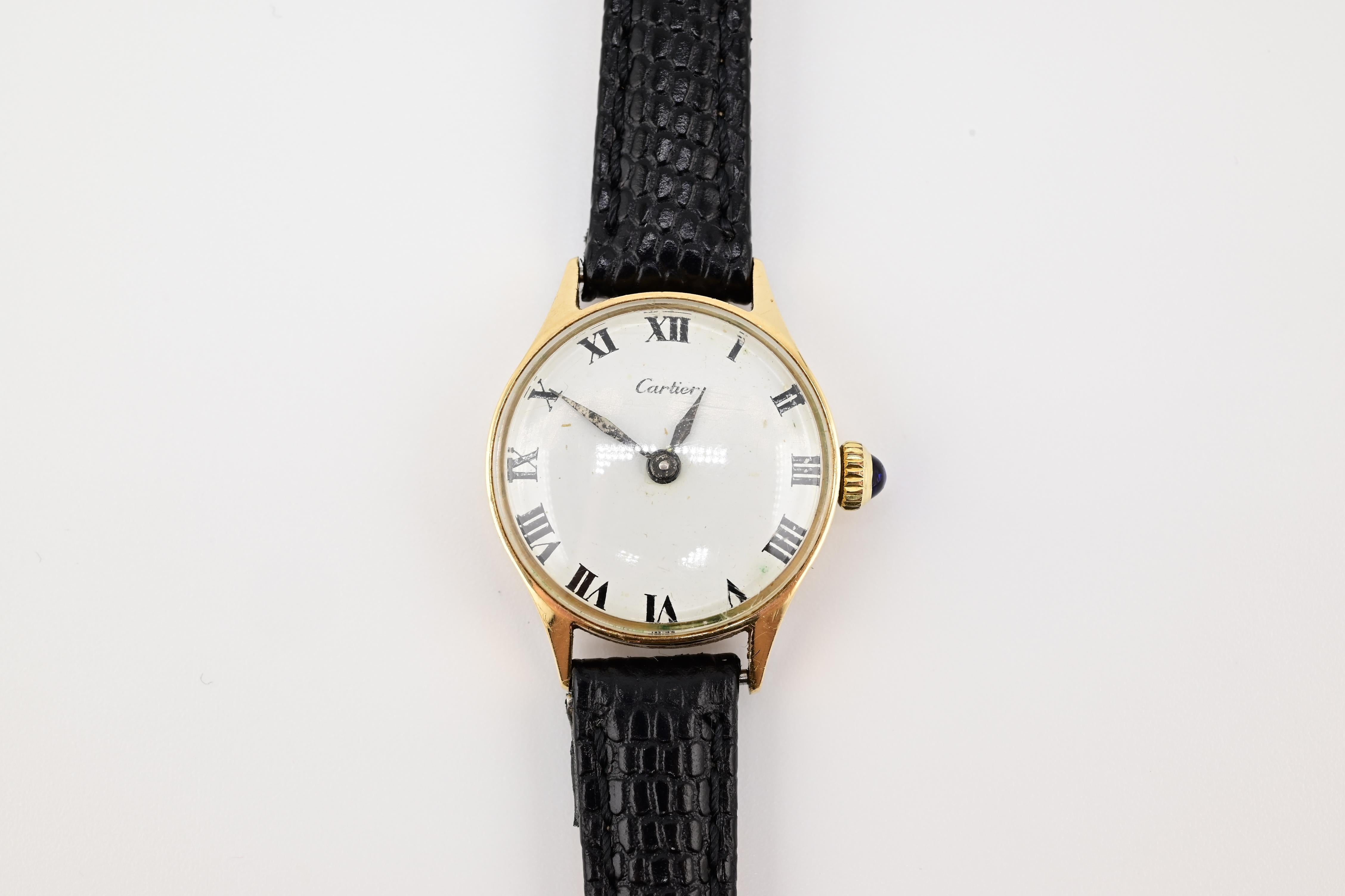 This is a fantastic 14 karat yellow gold Cartier watch but the movement is by Concord. Watch is manual winding and it works perfectly fine and runs well. I don't believe it is perfectly accurate since it is a vintage watch but it still keeps time