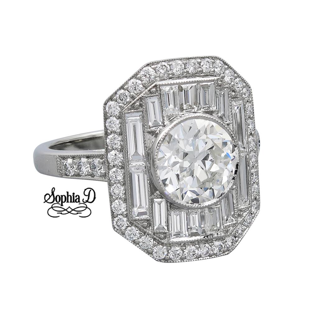 This Art Deco platinum ring has a center stone that weighs a total of 1.50 carat. Surrounded  and accentuated with baguette cut and round diamonds that is approximately 1.13 carats.

Sophia D by Joseph Dardashti LTD has been known worldwide for 35