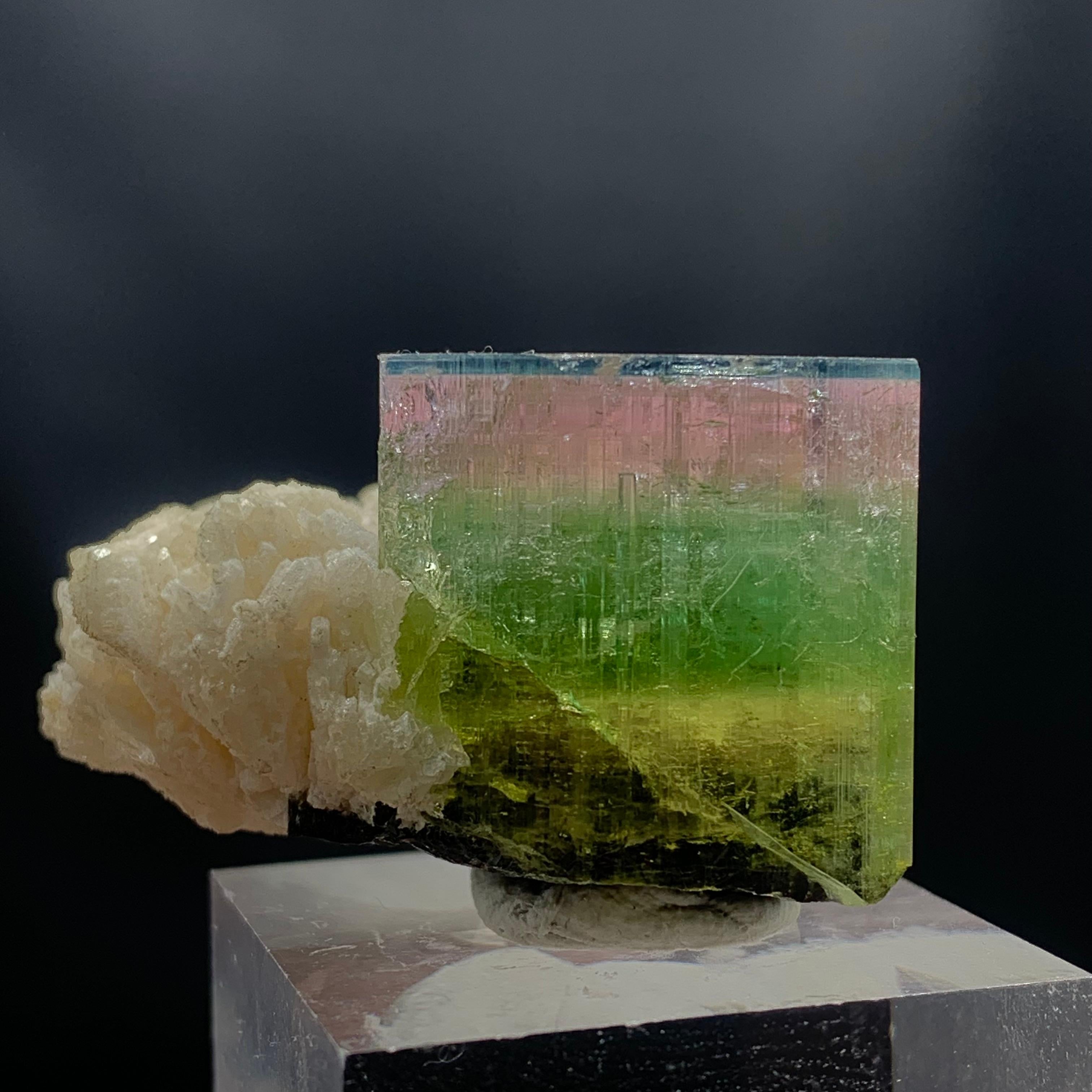 Gorgeous 160.40 Carat Tri Color Tourmaline Specimen From Nooristan Afghanistan 
WEIGHT: 160.40 grams
DIMENSIONS : 2.3 x 3.8 x 2.6 Cm
ORIGIN: Nooristan, Afghanistan
TREATMENT: None
Tourmaline is an extremely popular gemstone; the name Tourmaline