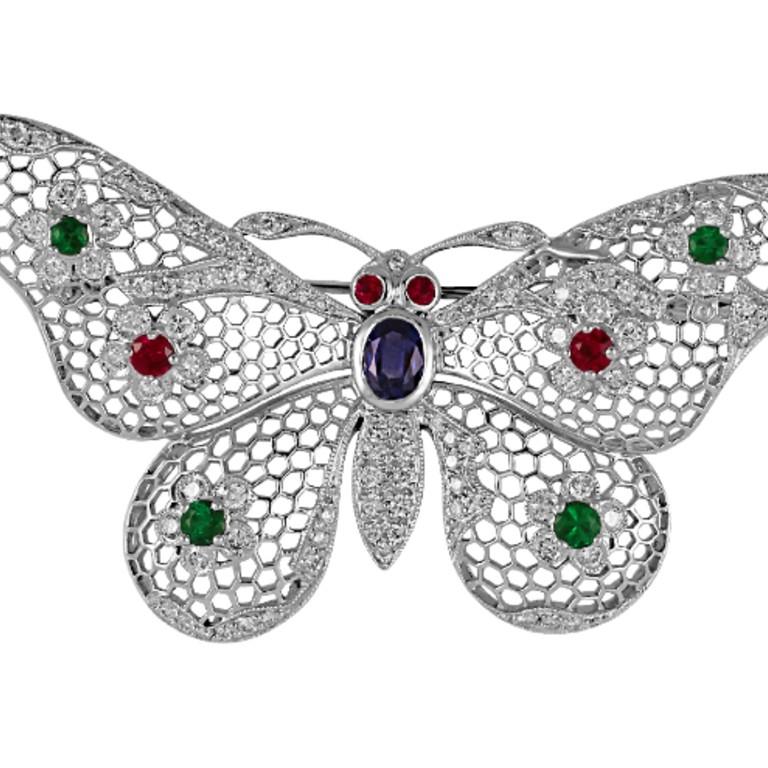 1.61 Carat Butterfly brooch set in platinum with 0.70 carats of Sapphire, 0.70 carats of Ruby, and 0.33 carat of Emerald. 