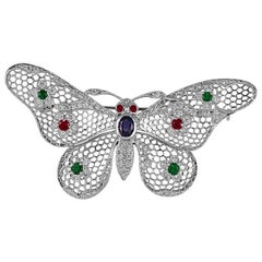 Broche papillon Sophia en rubis, émeraude, saphir et diamants de 1,61 carat