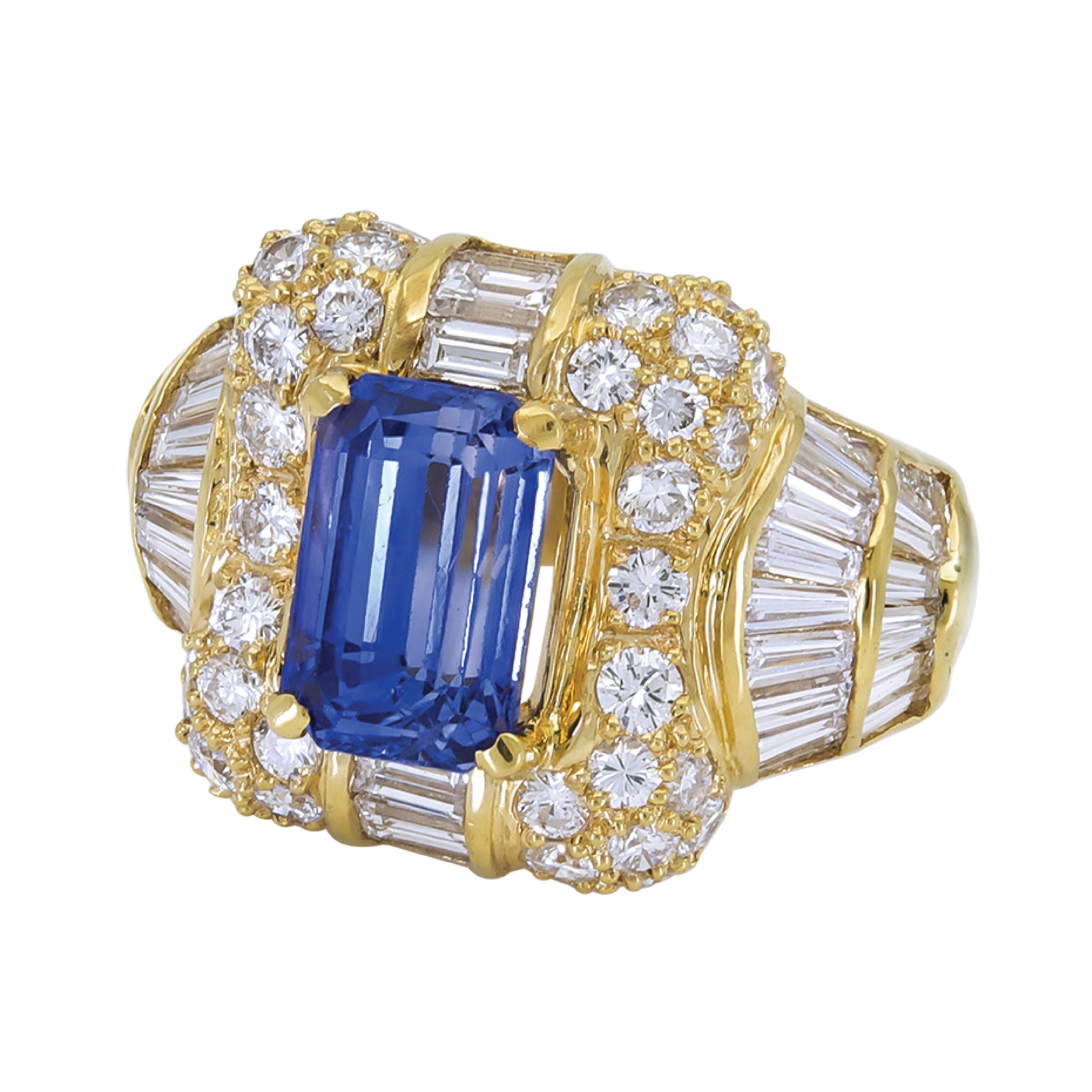 Sophia D. Emerald Cut Blue Sapphire center stone that weighs approximately 4.00 carats and surrounded by 3.20 carats total weight of diamonds dome ring set in 18 Karat Yellow Gold.

Sophia D by Joseph Dardashti LTD has been known worldwide for 35