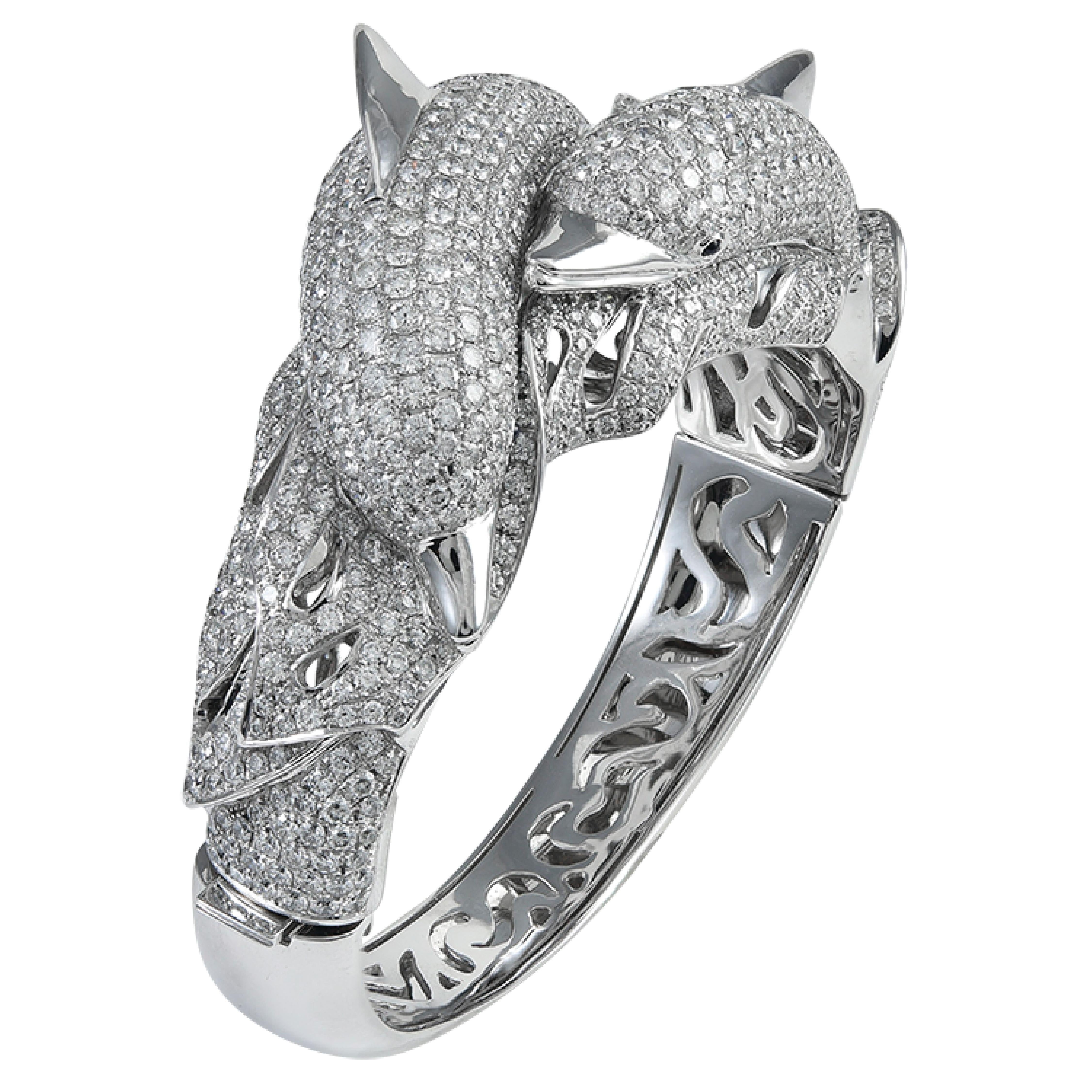 Impeccably designed dolphin shaped cuff created and designed by Sophia D, this cuff features 17.44 carats of brilliant cut diamonds in 18K white gold.

Sophia D by Joseph Dardashti LTD has been known worldwide for 35 years and are inspired by