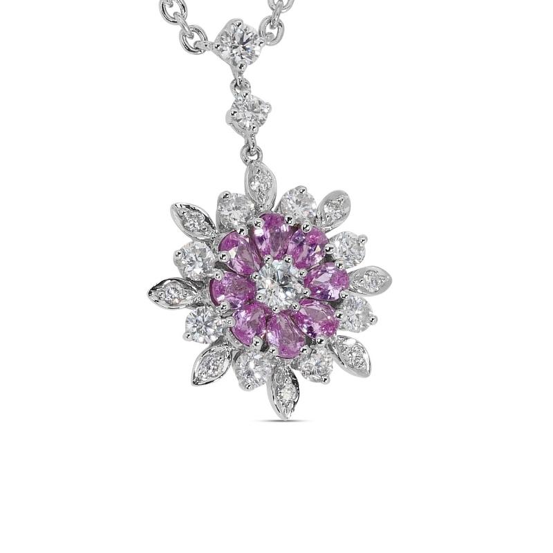 Pear Shape Pink Sapphire and Diamond Snowflake Shape 18K White Gold Necklace with 1.74 Total Carat Weight.

-8 sapphire main stones of 0.10625 ct. each, total: 0.85 ct.
cut: pear shape
color: pink

-19 diamond side stones of 0.0468 ct. each, total:
