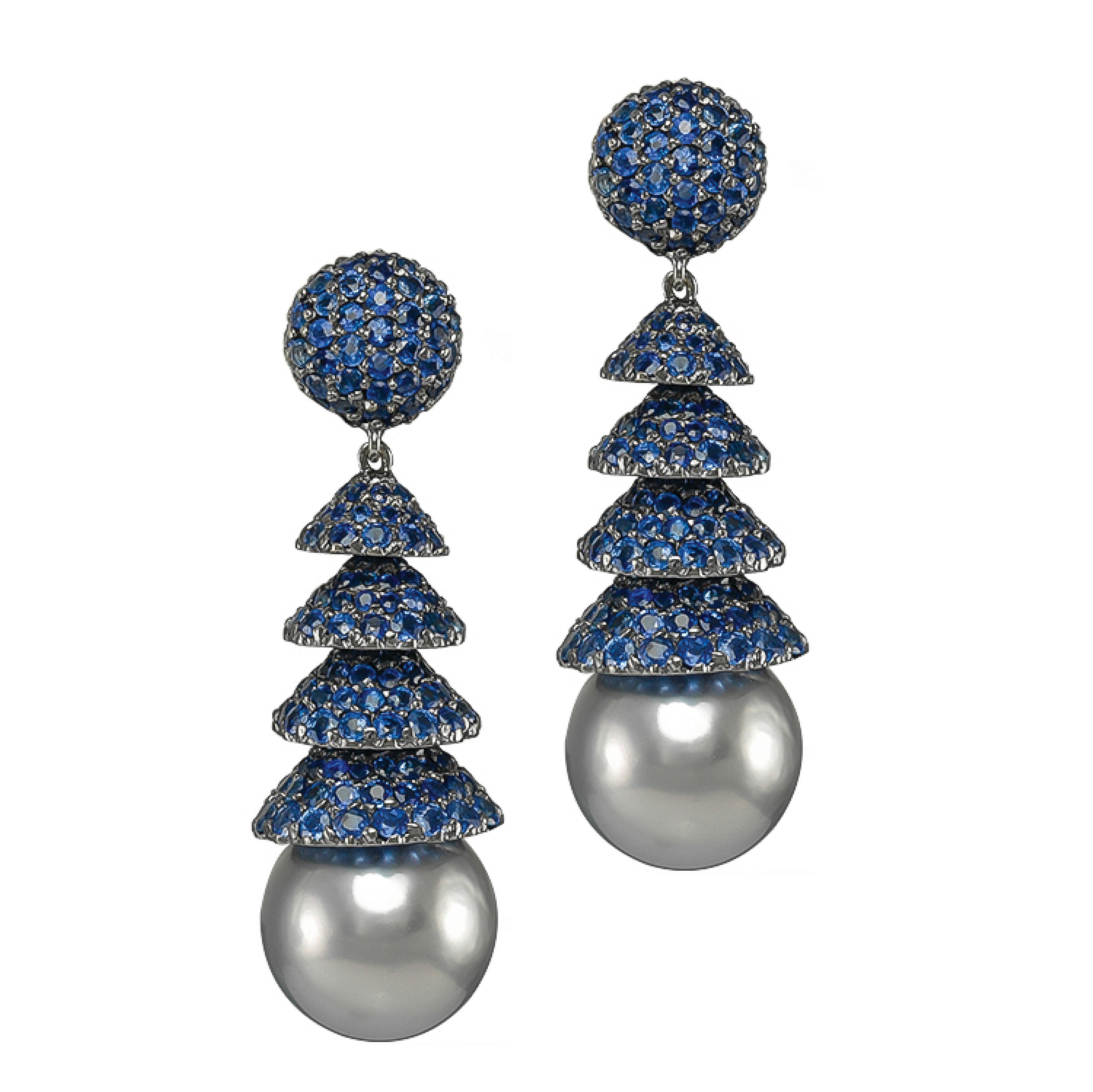 Pair of 18K White Gold drop earrings that features blue sapphires weighing 16.16 carats with Black Pearls.

Sophia D by Joseph Dardashti LTD has been known worldwide for 35 years and are inspired by classic Art Deco design that merges with modern