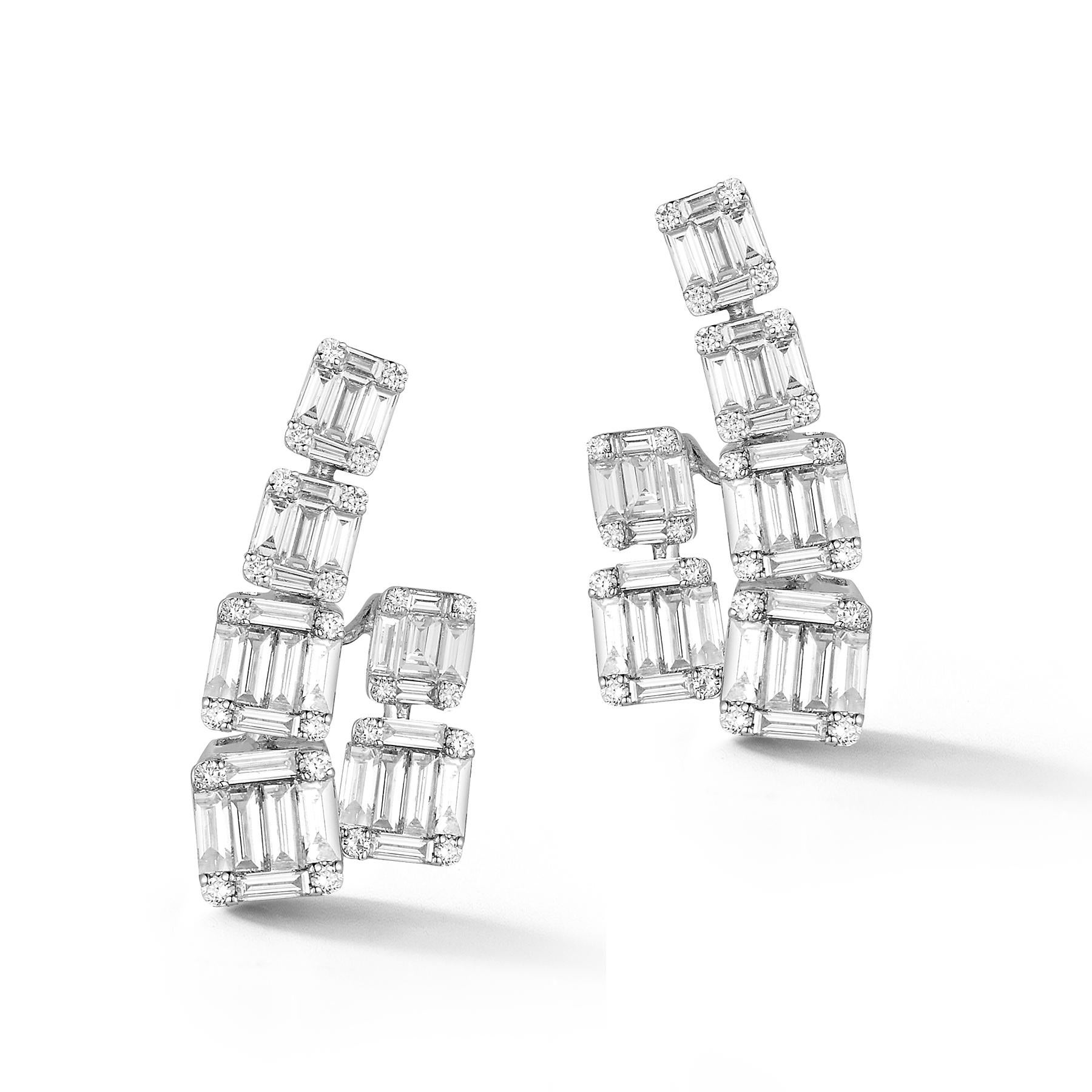 Stunning 18K White Gold Earrings in Striking, Unusual Hanging-Design with 48 Flawless White Round Diamonds and 66 Flawless White Baguette-shaped Diamonds weighing a total of 3.32 Carats.