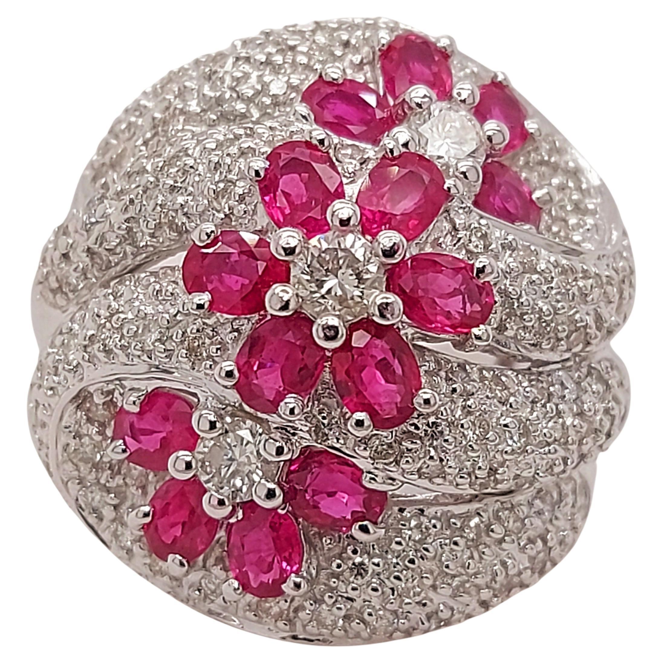 Gorgeous 18kt White Gold Ring with Diamonds and Rubies

Diamonds: 112 small diamonds together 1.86ct, 3 big diamonds together 0.60 ct all diamonds together 2.46ct diamonds

Ruby: 14 rubies total 3.3 ct

Material: 18kt White Gold

Ring size: 56 EU /