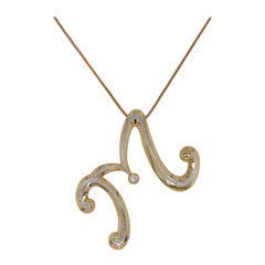 Gorgeous 18kt Yellow Gold Necklace with the letter M with 0.20 Ct Diamond